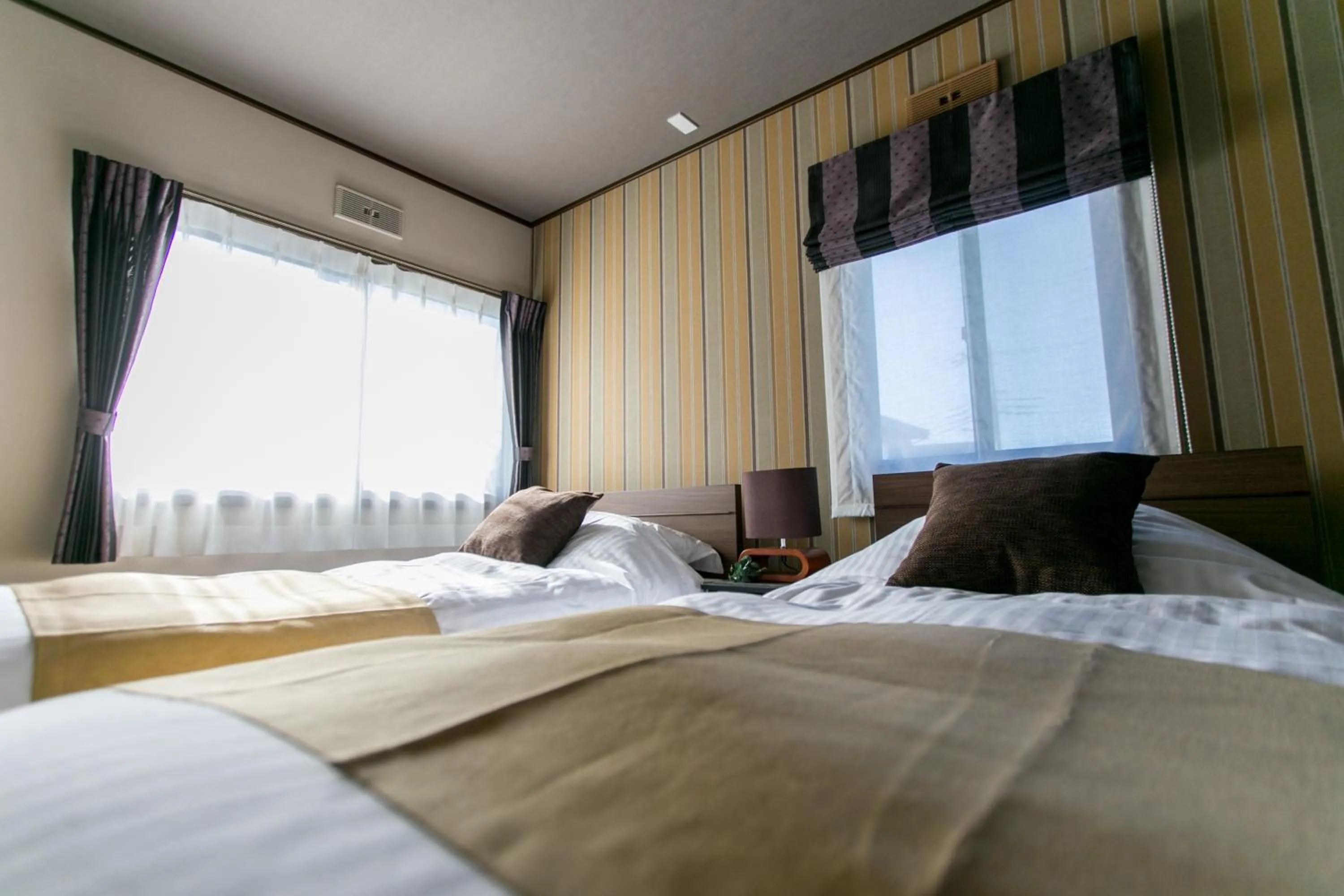 Bed in villa yawaragi