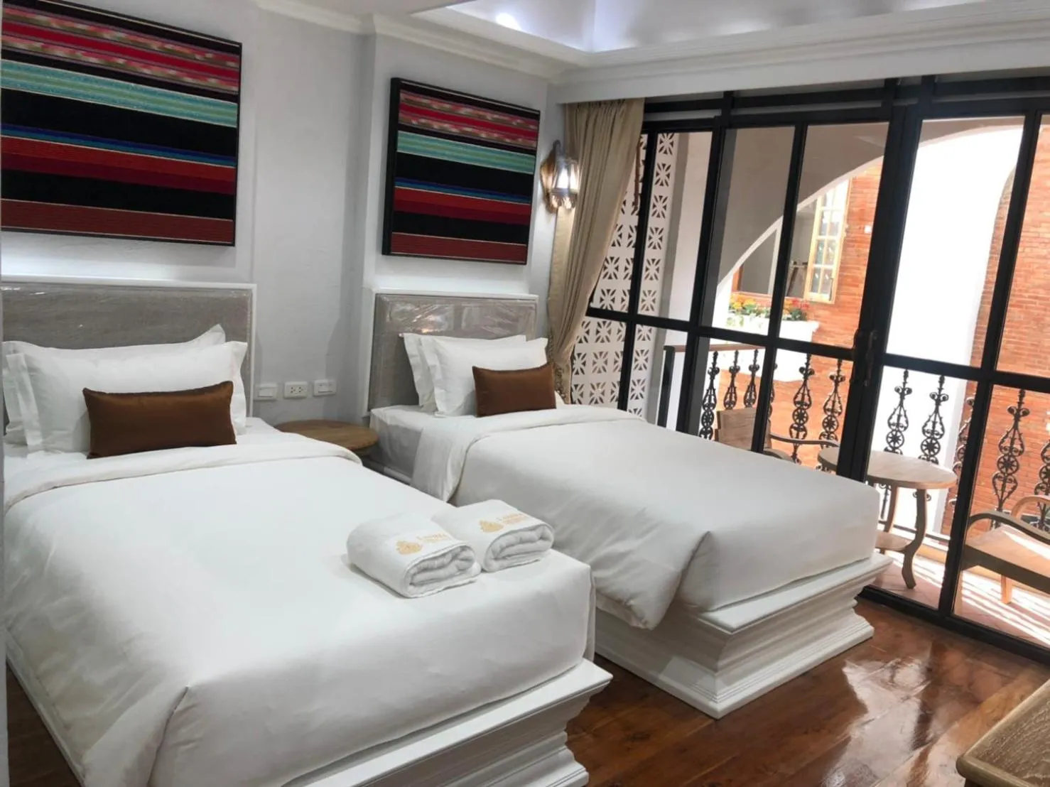 Bed in Lanna Oriental Hotel