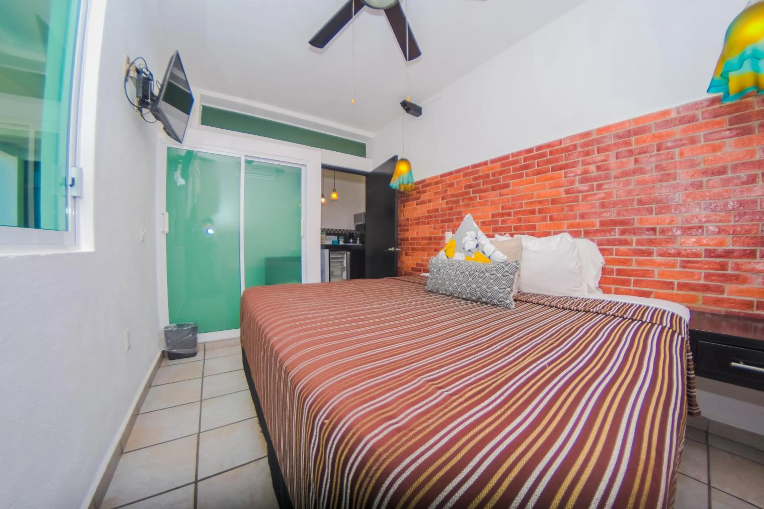 Photo of the whole room, Bed in Hotel Suites Nadia Puerto Vallarta