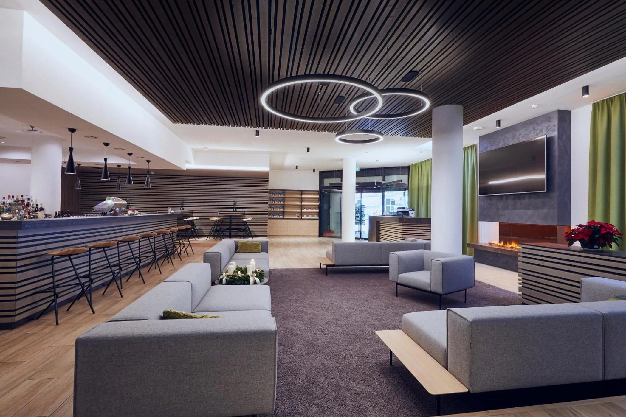 Lounge or bar in Hotel Planai by Alpeffect Hotels