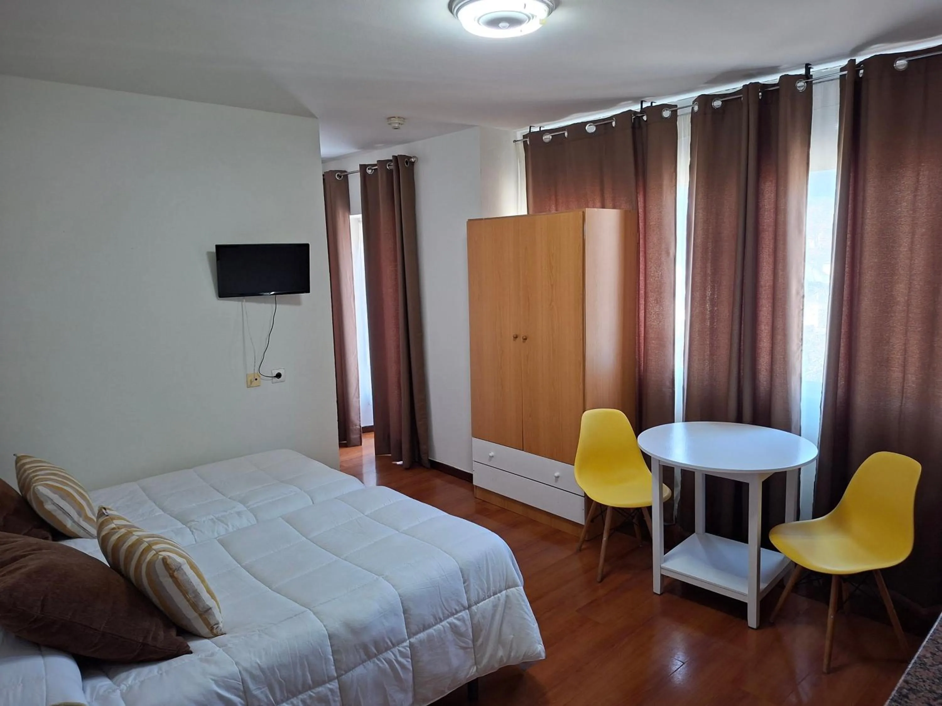 Bed in Apartahotel portal de leon