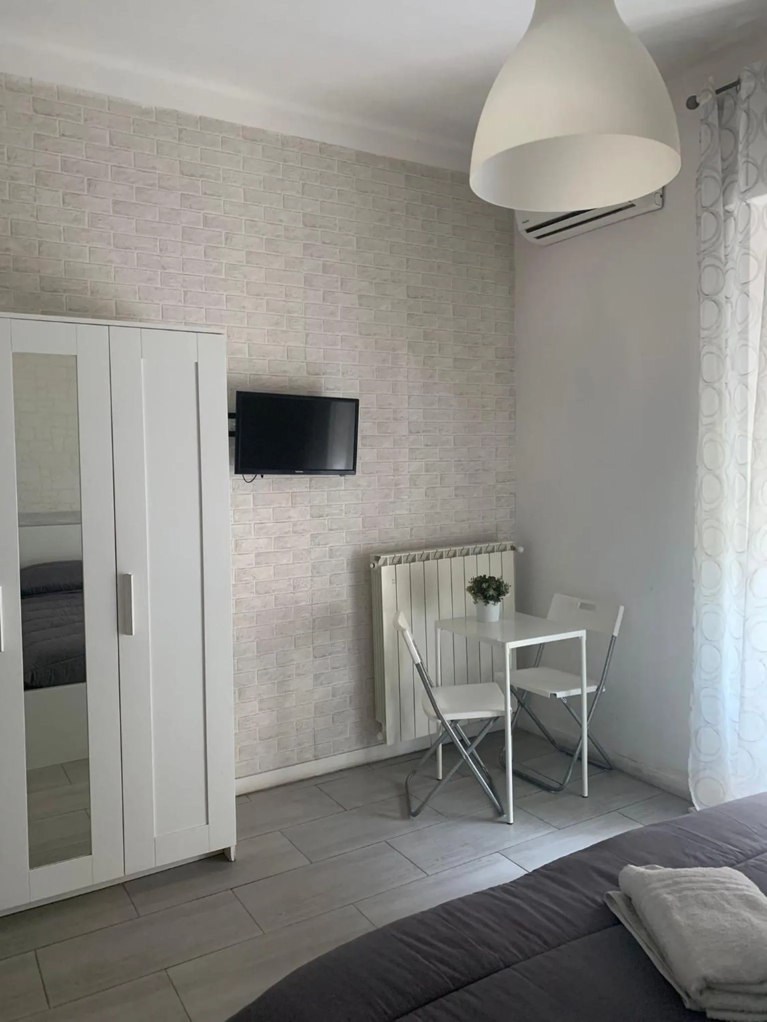 TV and multimedia, Bed in B&B LE COCCINELLE