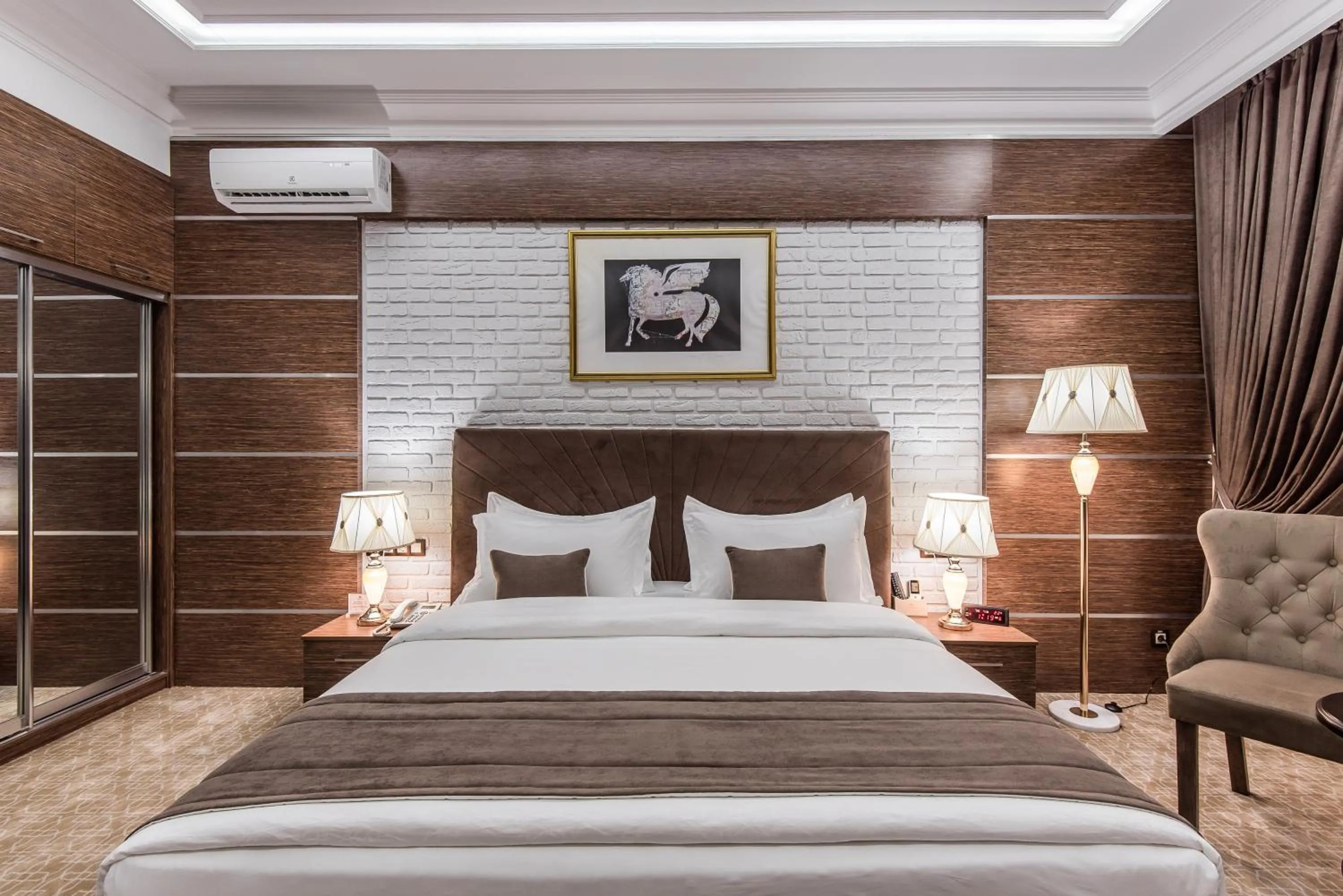 Bed in The Royal Mezbon Hotel & SPA