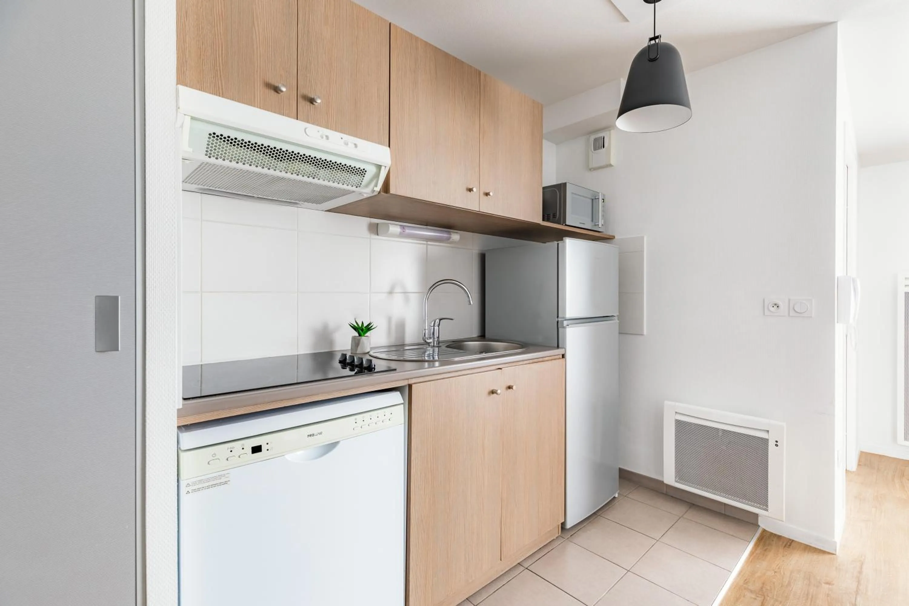 Kitchen or kitchenette in Appart'City Confort Niort Centre