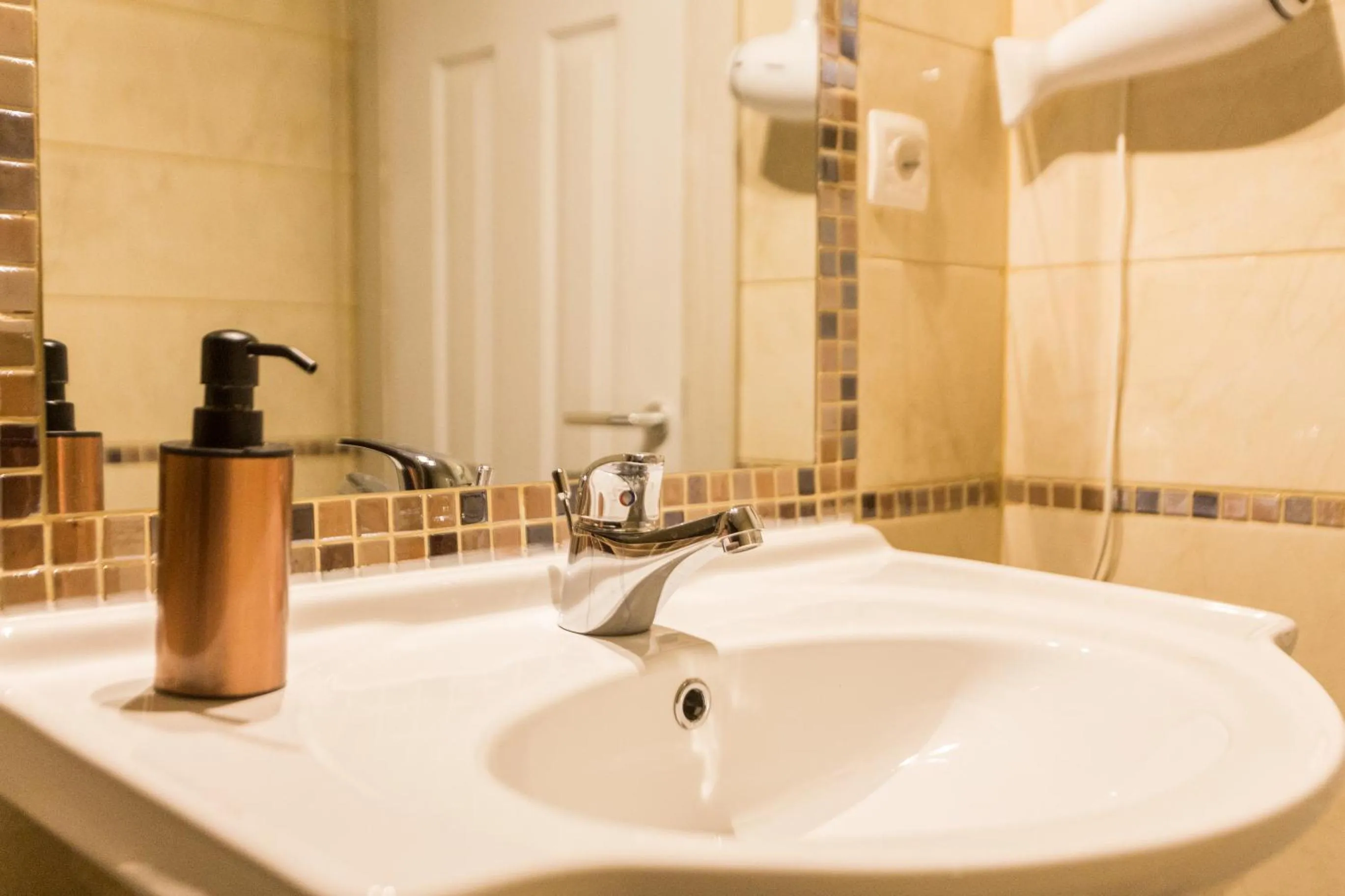 Bathroom in Aloha Apartments with pool