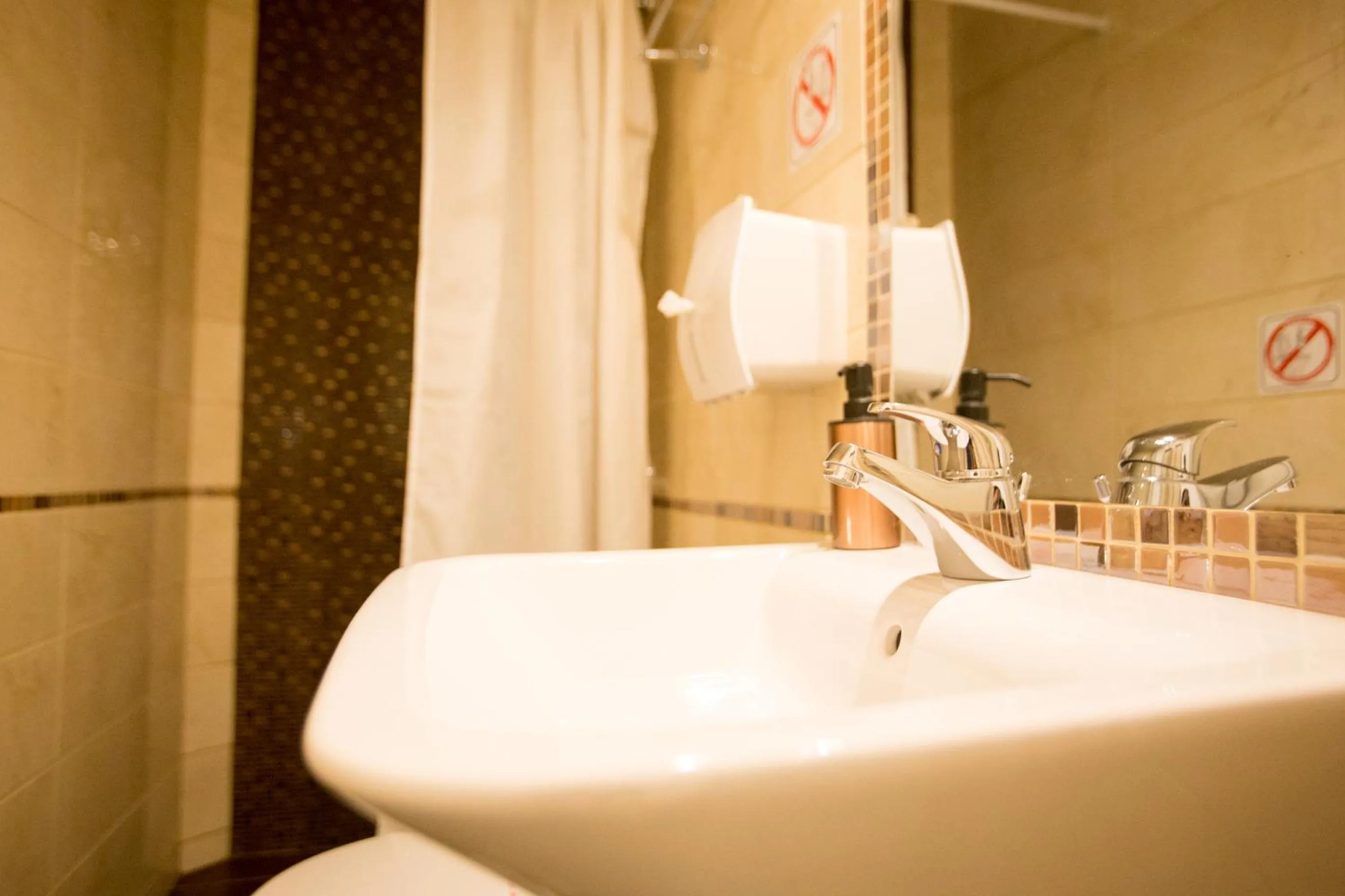 Bathroom in Aloha Apartments with pool