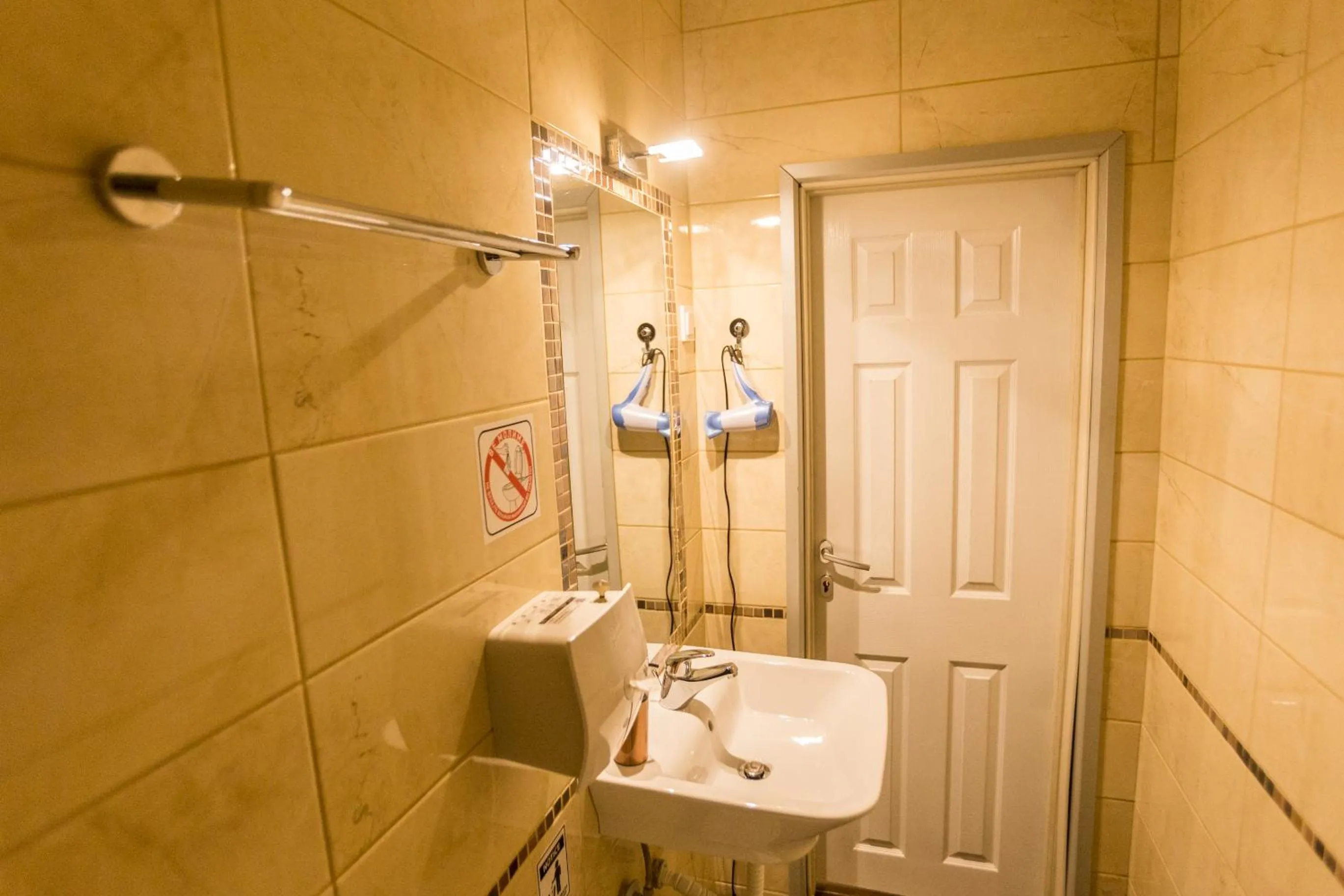 Bathroom in Aloha Apartments with pool