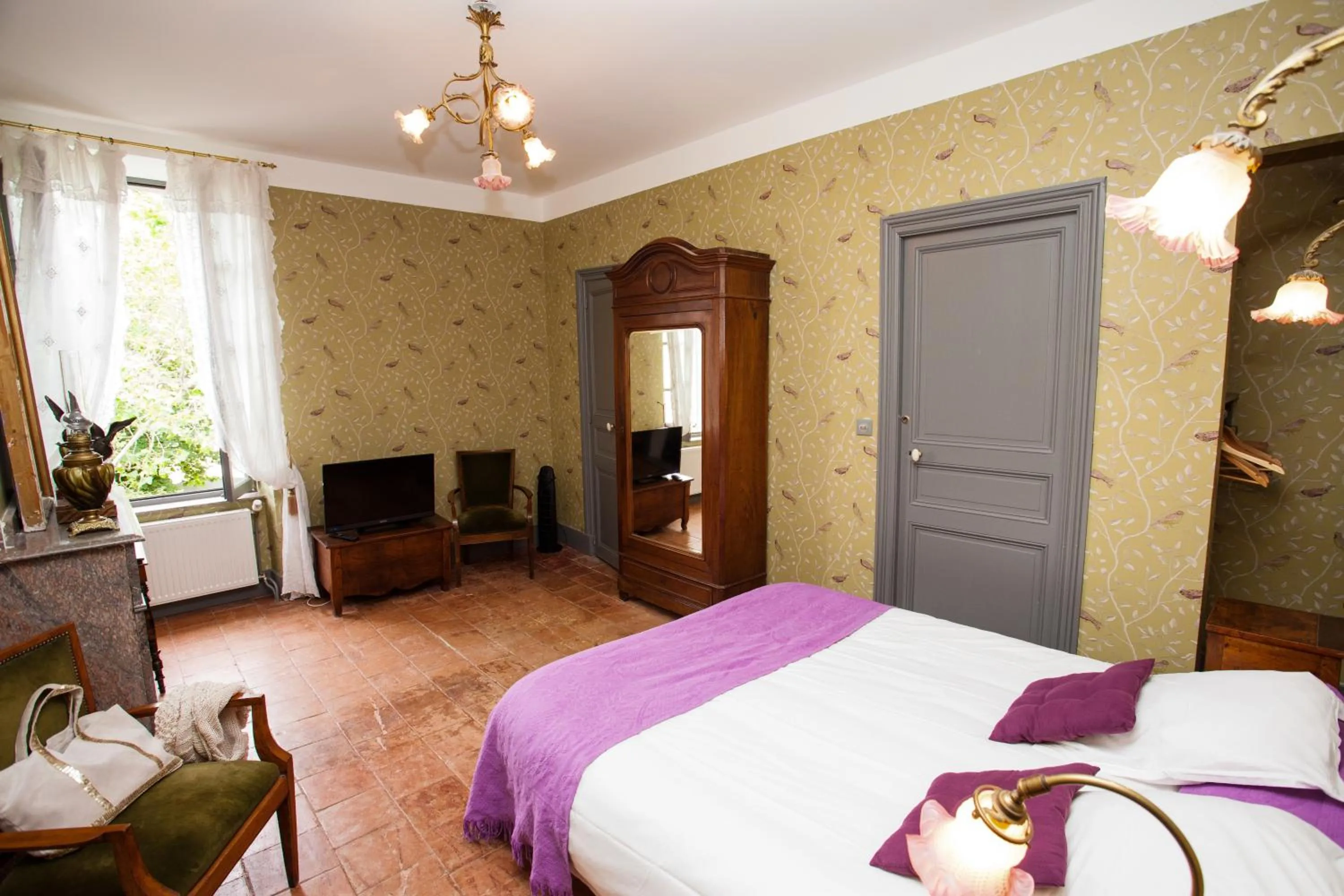 Bed in Logis Hotel - Restaurant La Marbrerie