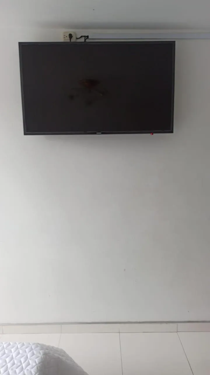 TV/Entertainment Center in Hotel Mi Gloria