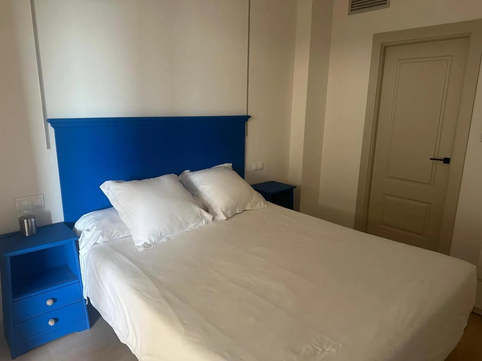 Bed in Apartamentos Guadalpin Boutique