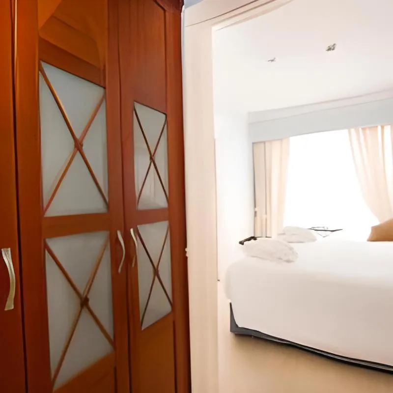 Bed in Apartamentos Guadalpin Boutique