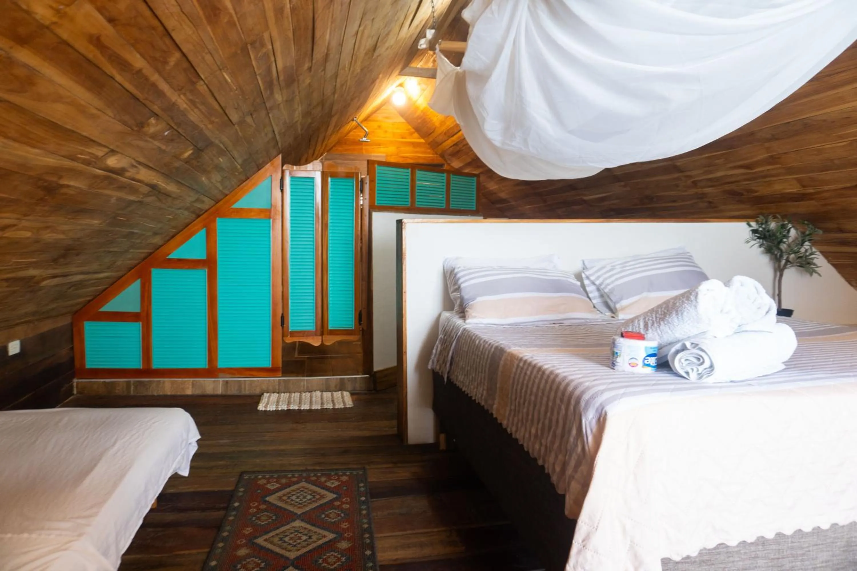 Bed in Hotel Calamari Baru