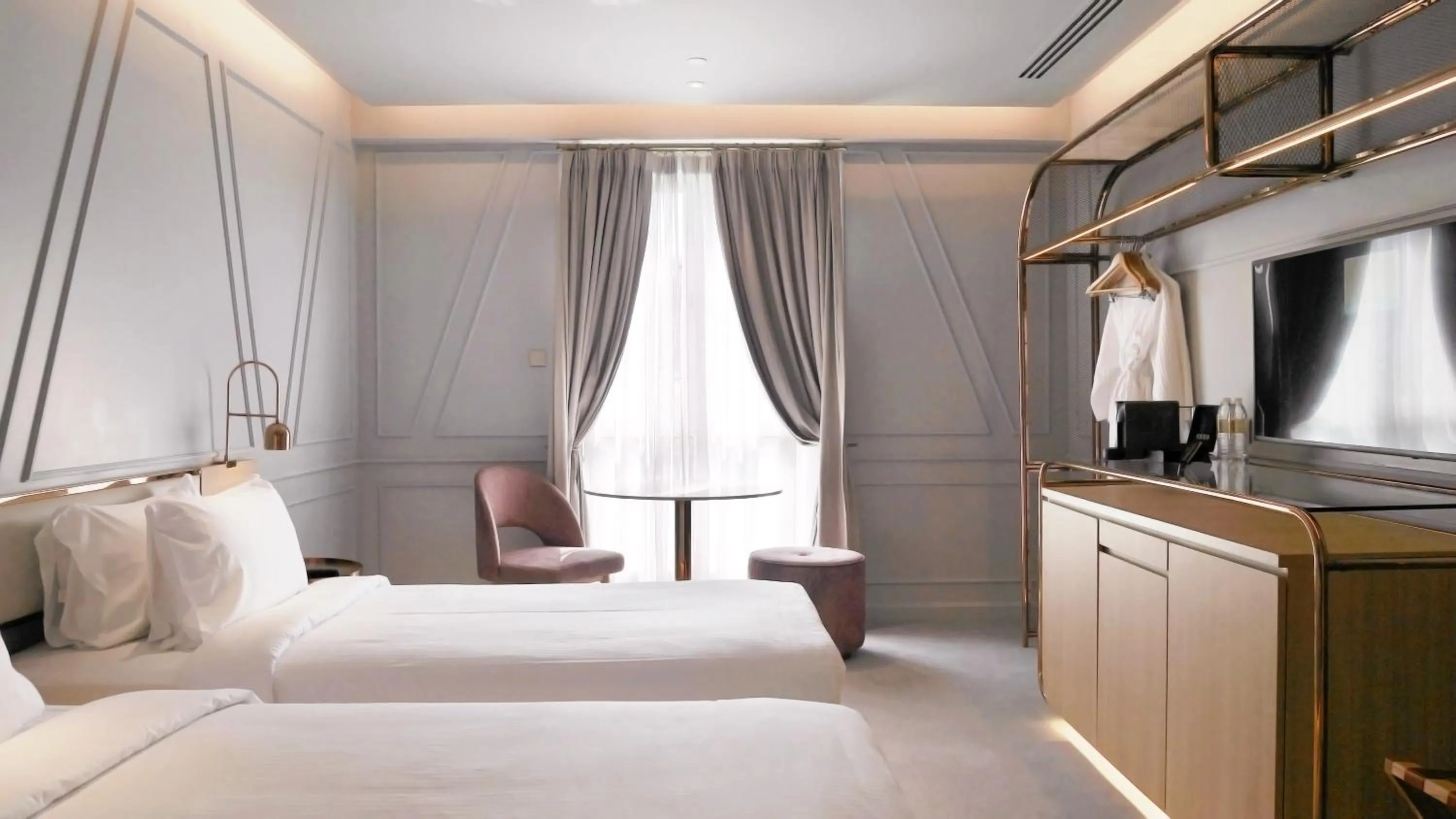 Bed in The Prestige Hotel Penang, a Member of Design Hotels