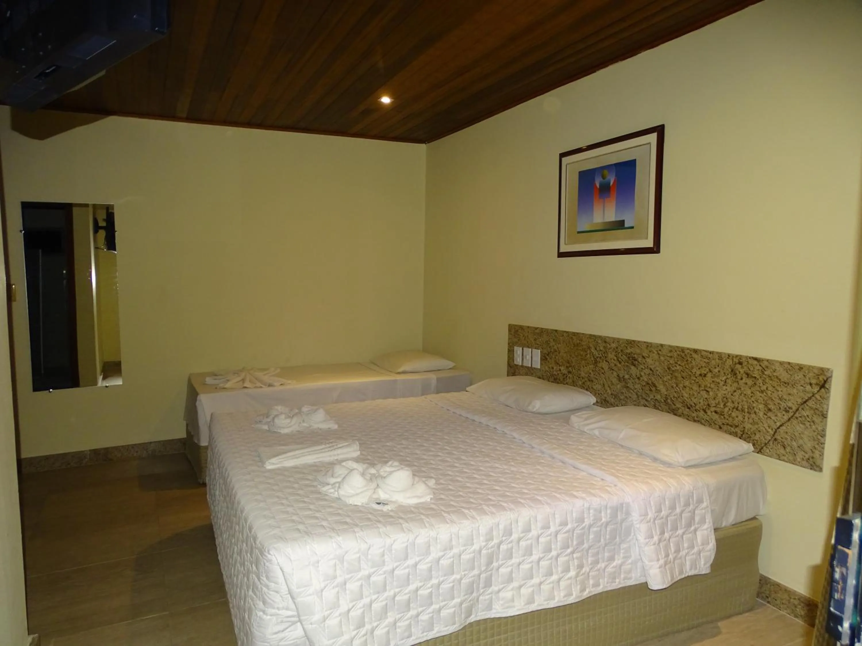 Photo of the whole room, Bed in Porto Bali Hotel