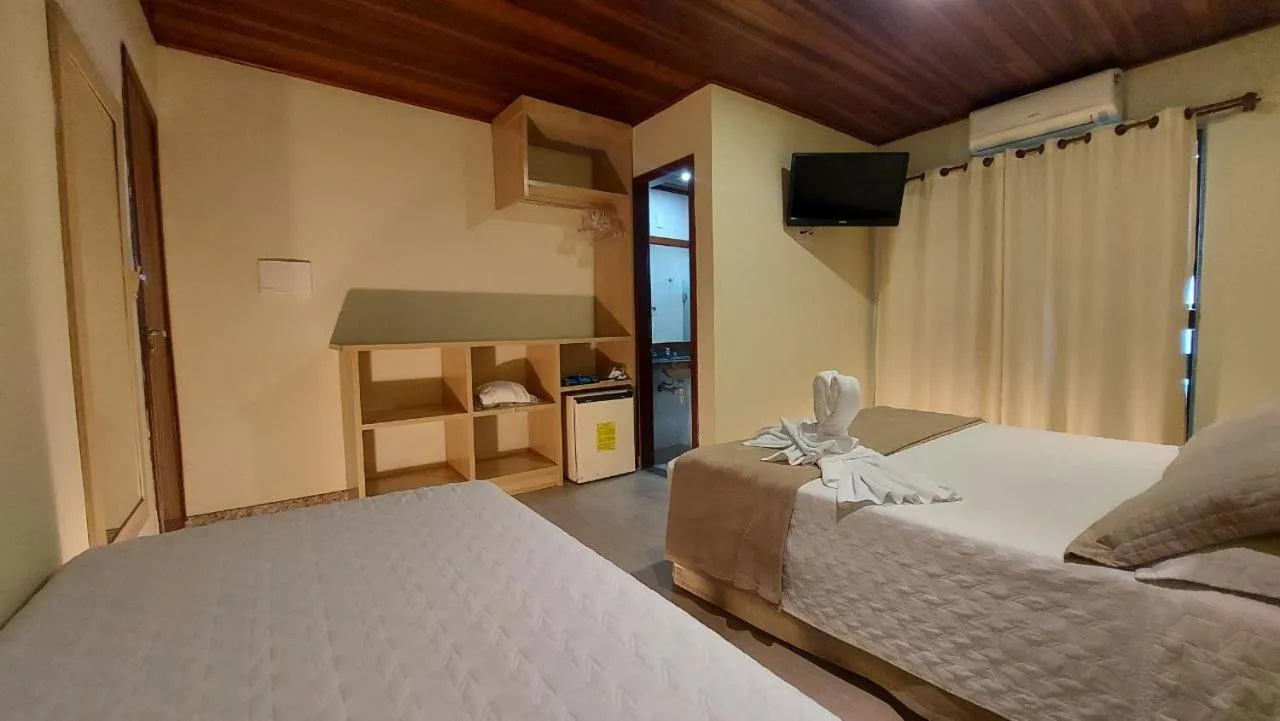 Bed in Porto Bali Hotel