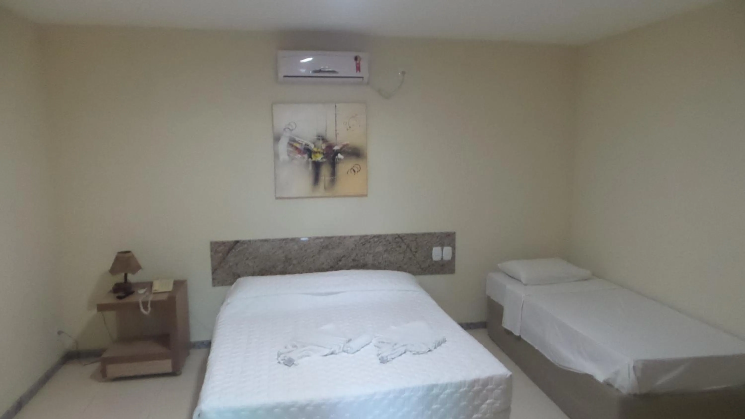 Photo of the whole room, Bed in Porto Bali Hotel