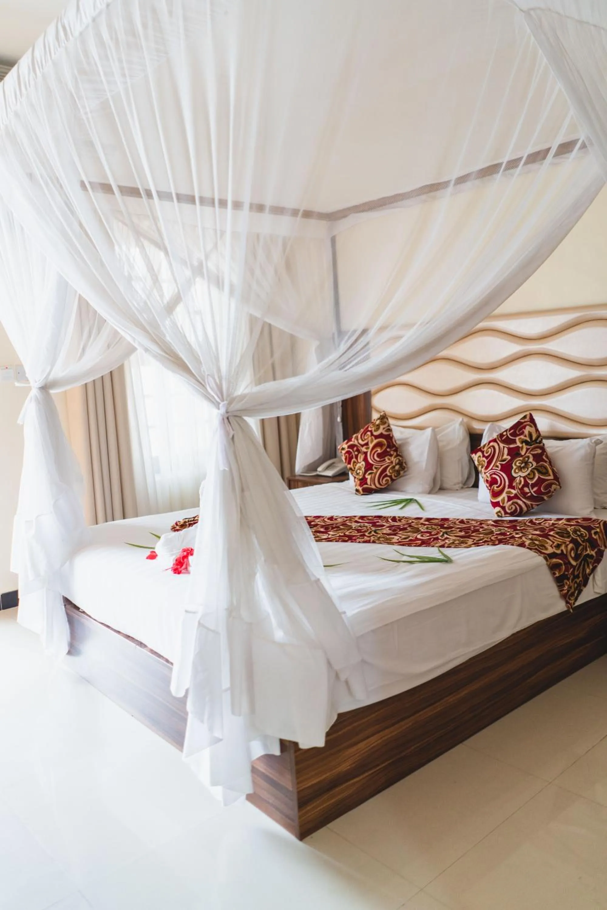 Bed in Antonio Garden Hotel