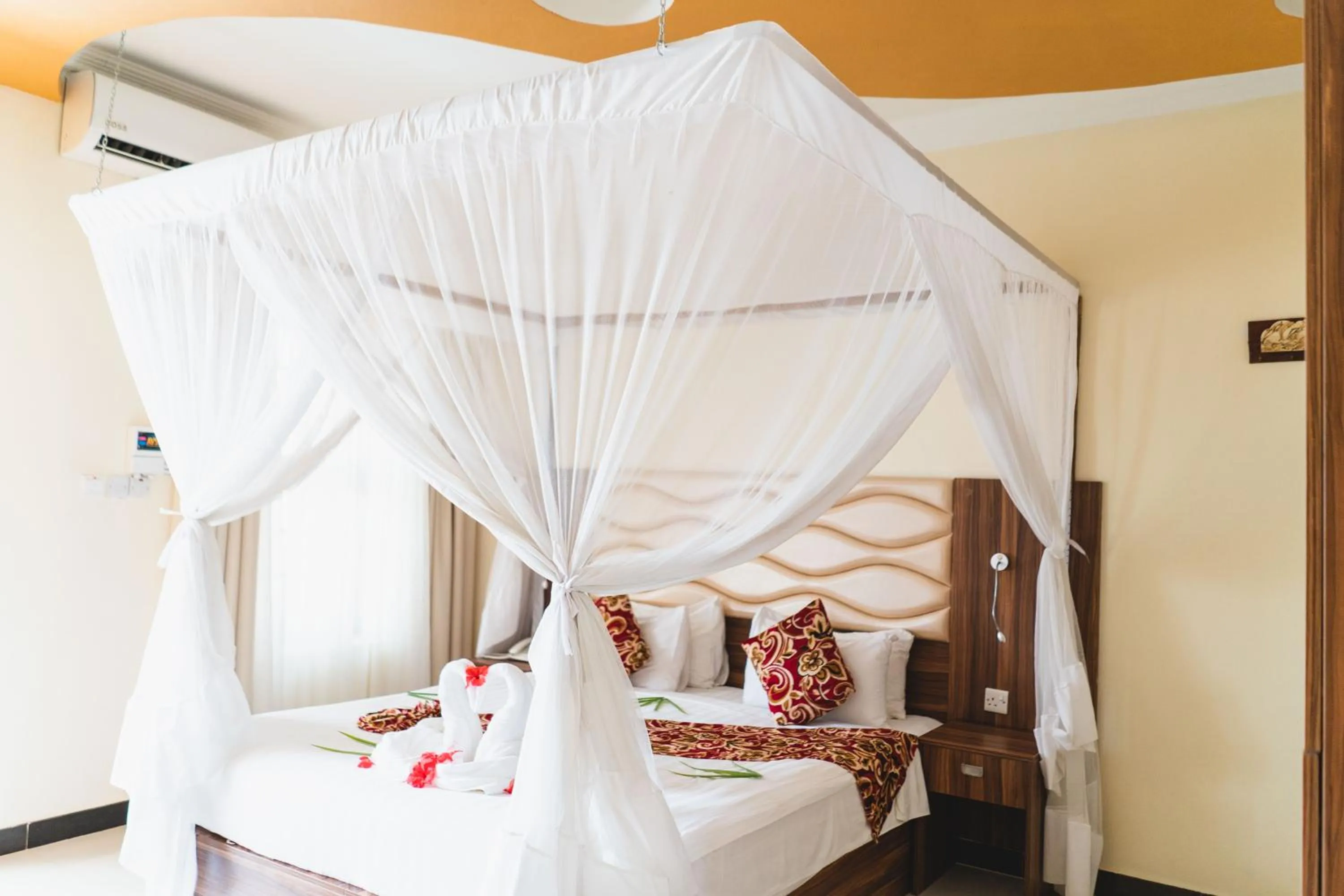 Bed in Antonio Garden Hotel