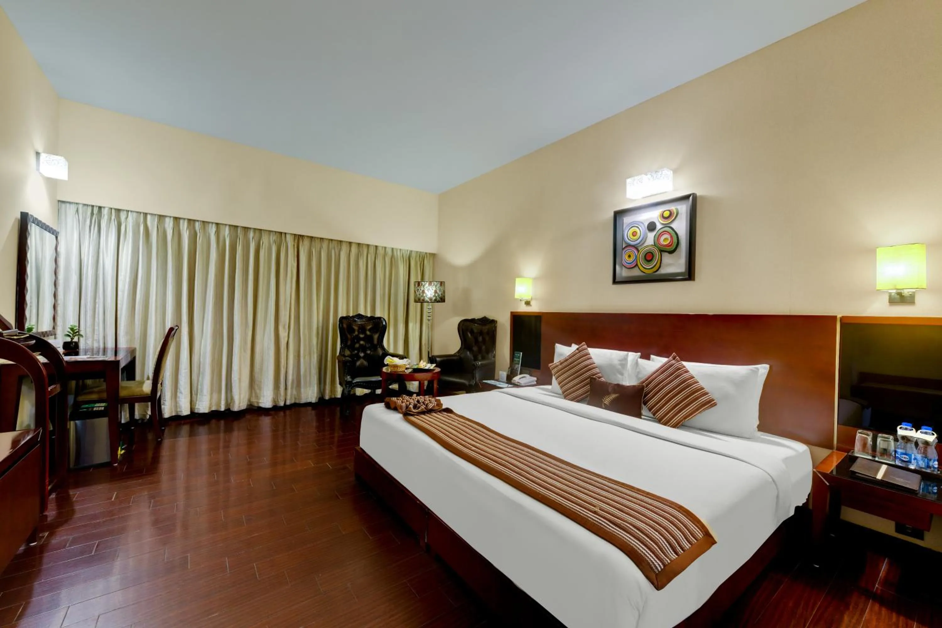 Photo of the whole room, Bed in The Fern Residency Rajkot, Series by Marriott