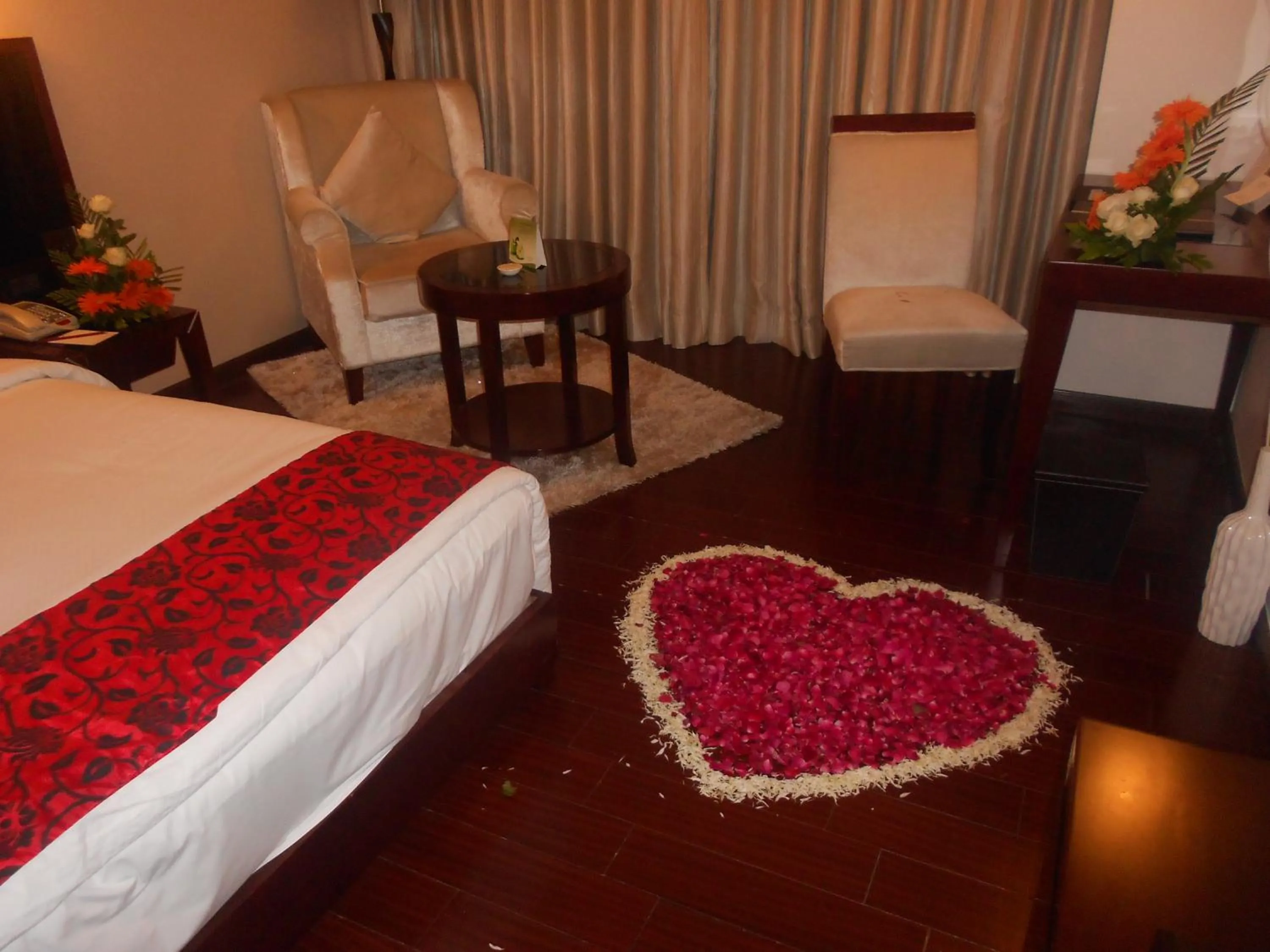 Photo of the whole room, Bed in The Fern Residency Rajkot, Series by Marriott