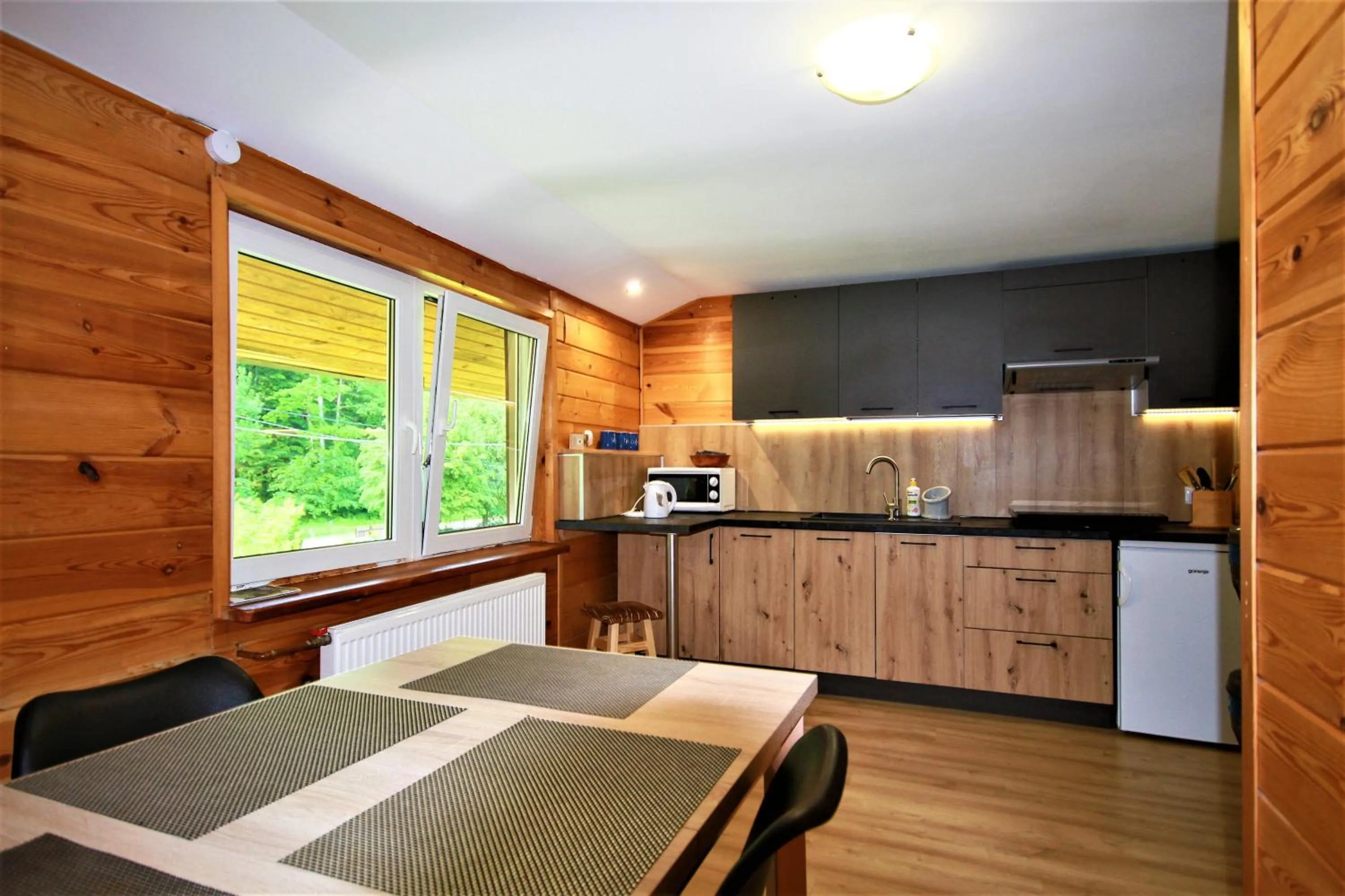 Kitchen or kitchenette in Białowieska Leśniczówka "U Jasia i Małgosi"