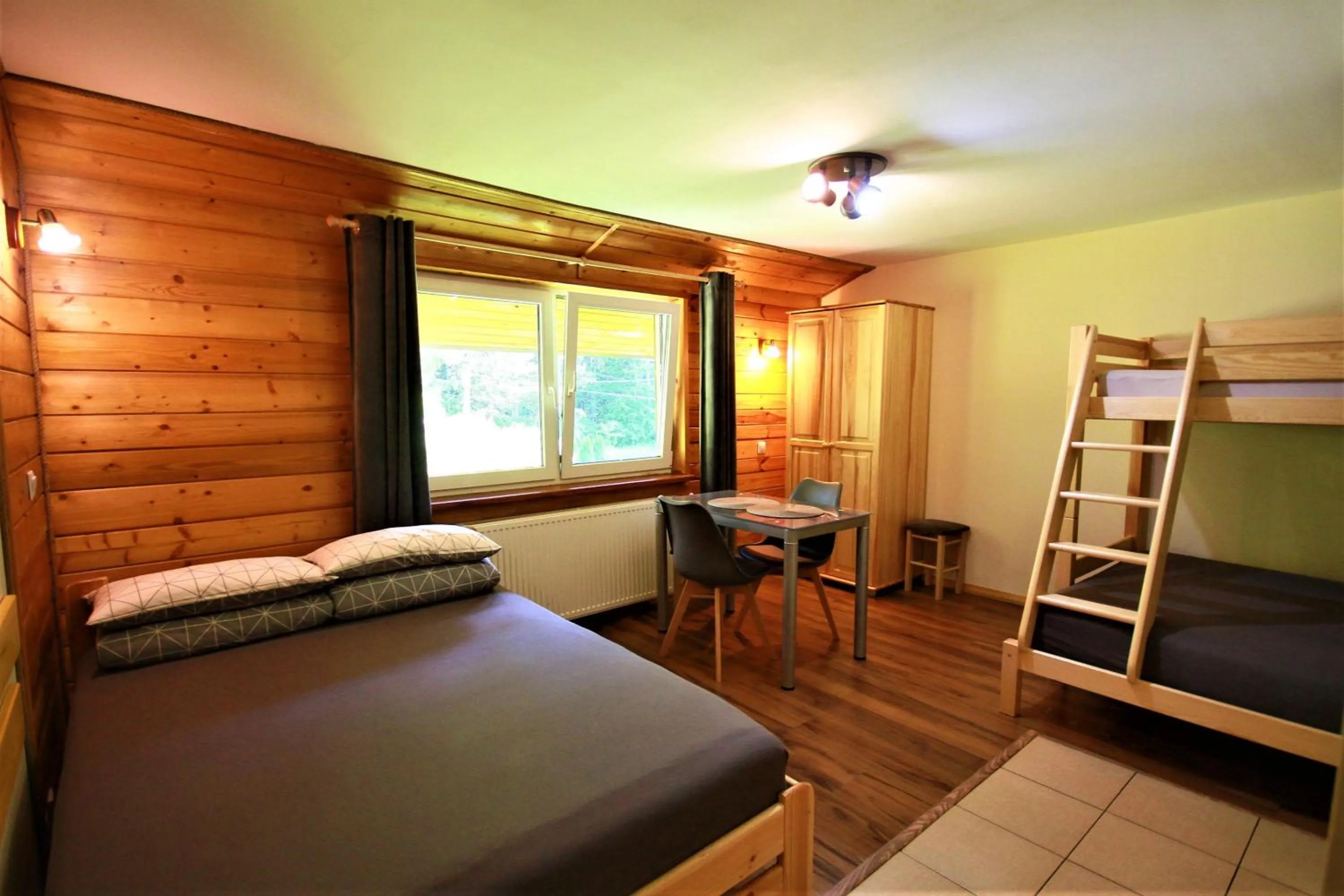 Bed in Białowieska Leśniczówka "U Jasia i Małgosi"