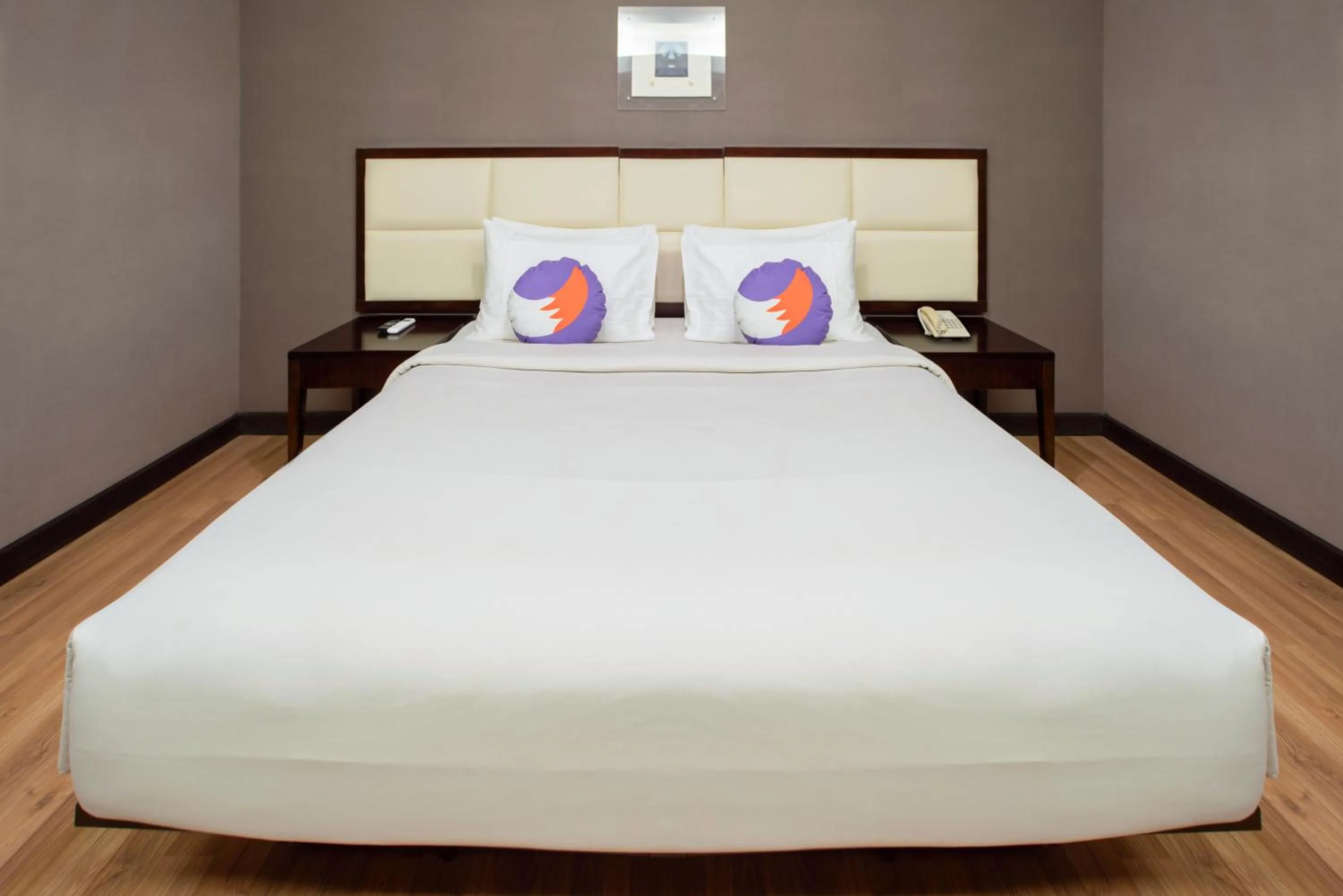 Bathroom, Bed in Maqna Hotel By Prasanthi