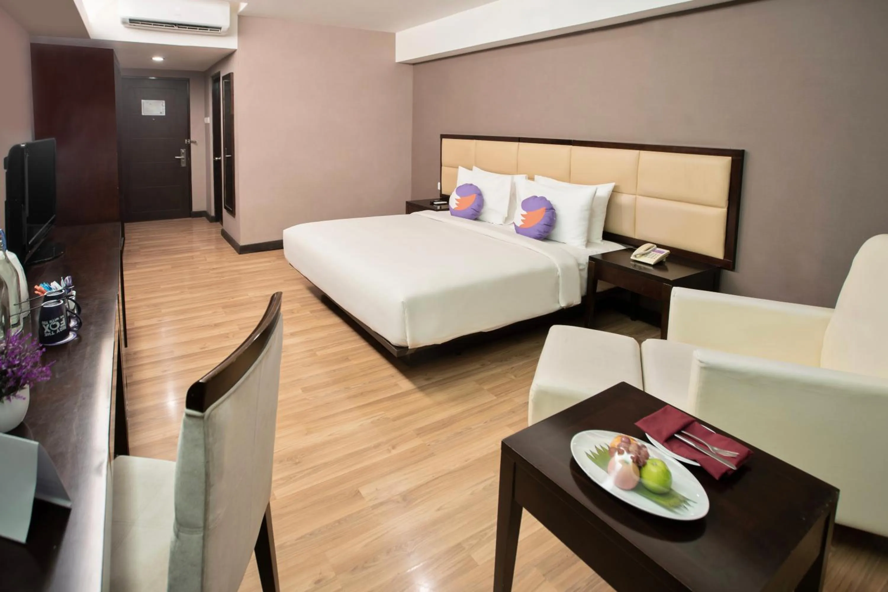 Bedroom, Bed in Maqna Hotel By Prasanthi