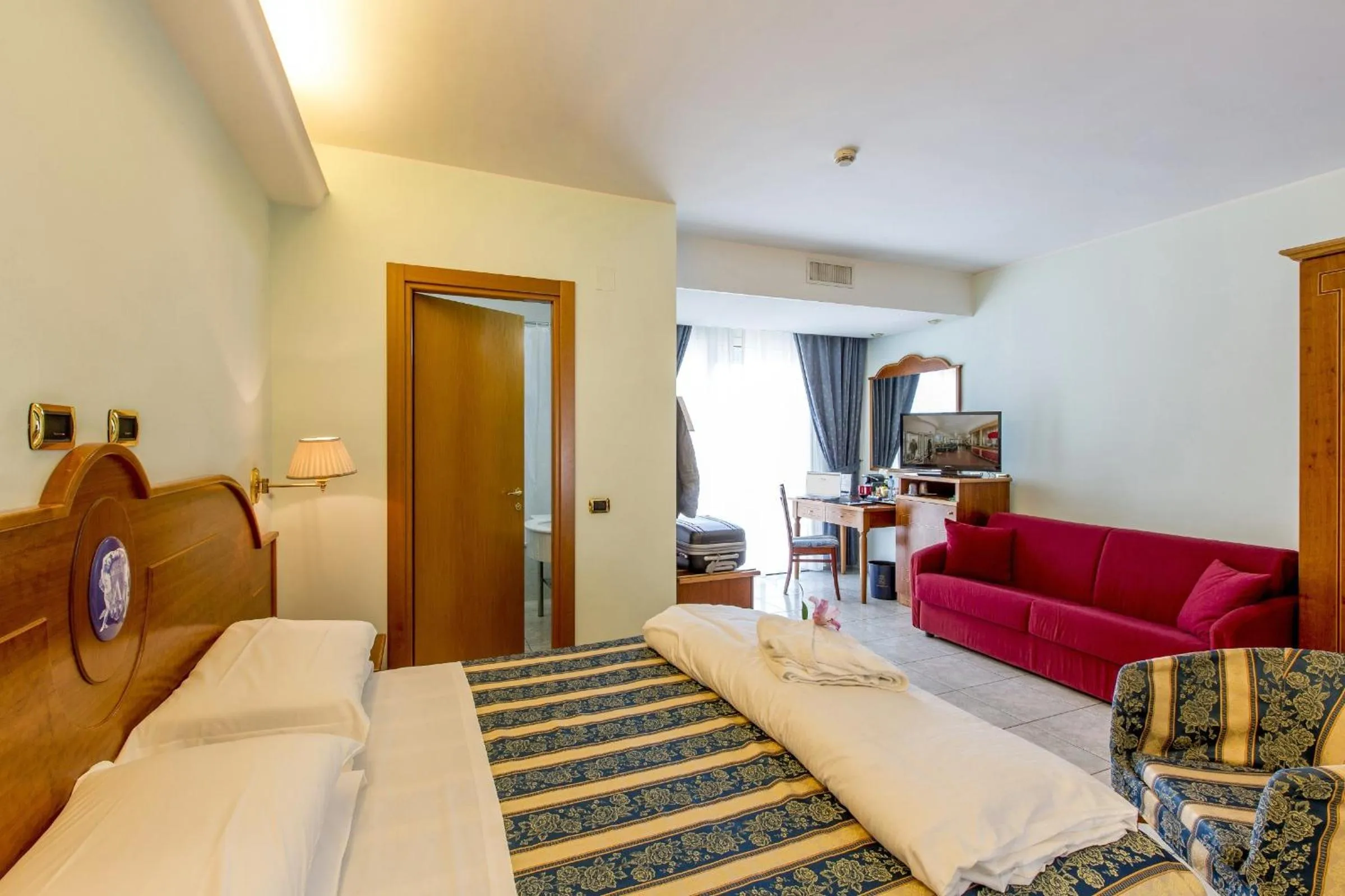 Bed in Hotel Ambassador