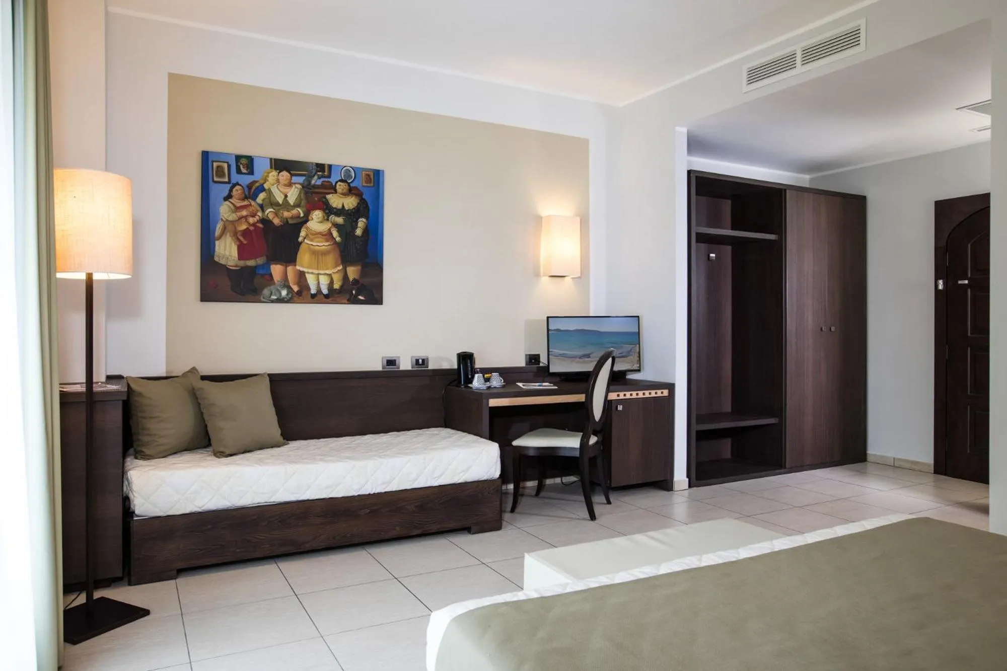 Seating area, Bed in Lu' Hotel Carbonia