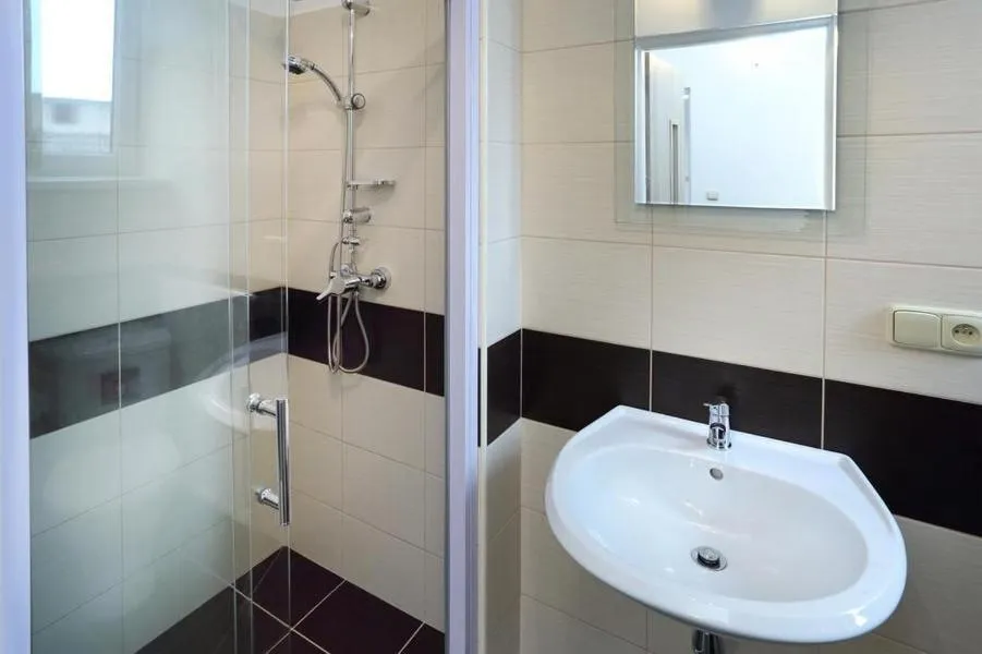 Bathroom in Aparthotel Brokeš