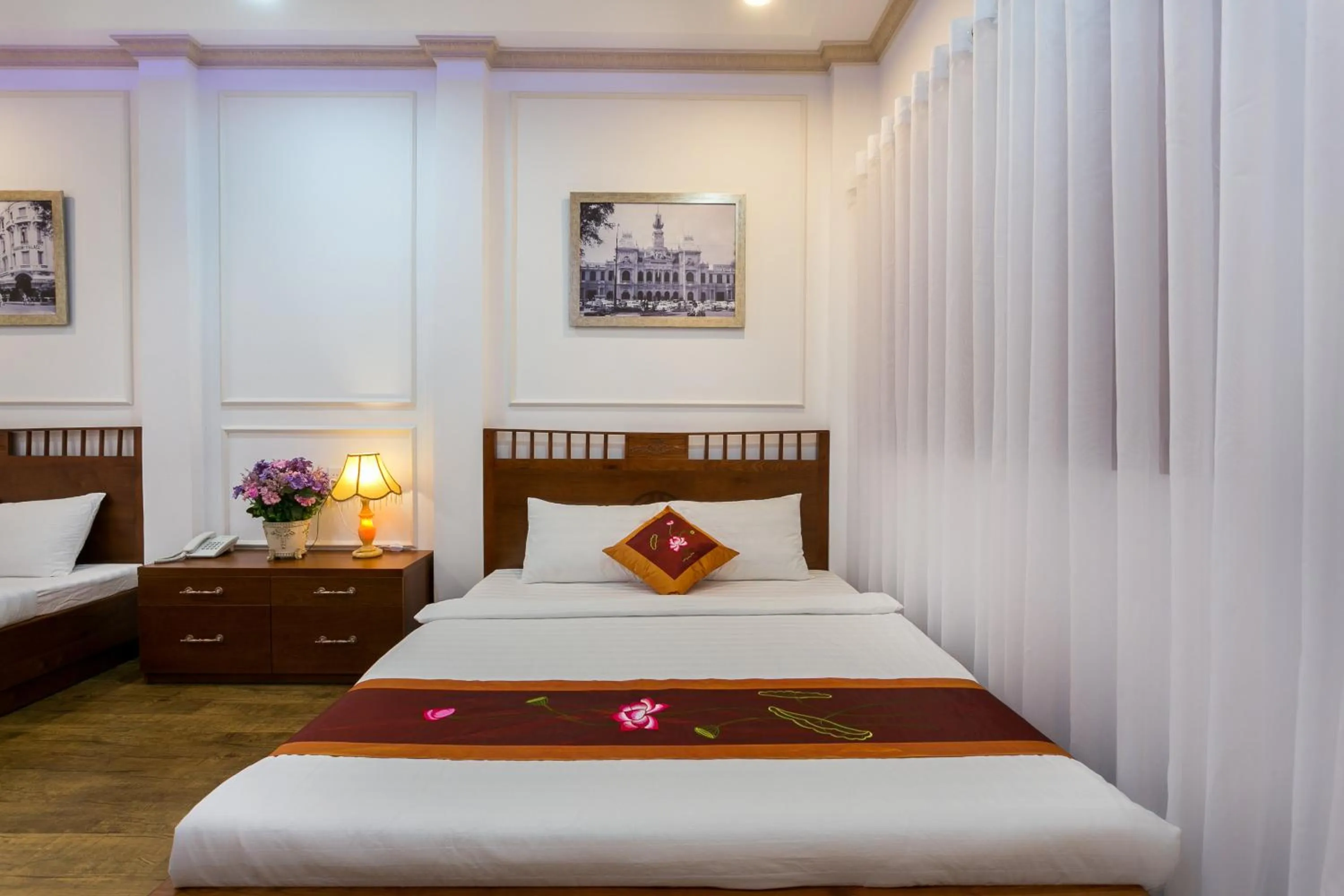 Bed in Indochine Ben Thanh Hotel & Apartments