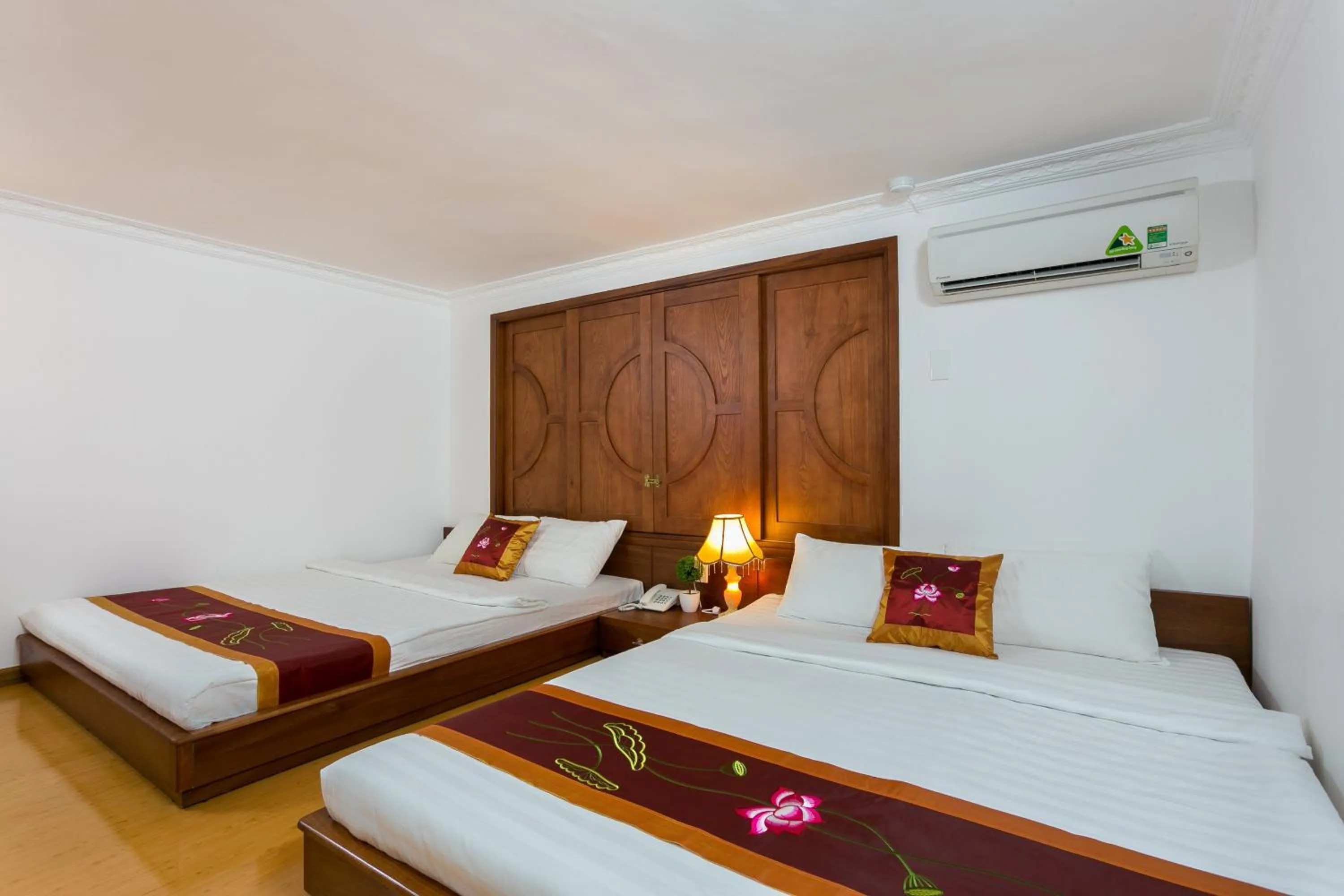 Bed in Indochine Ben Thanh Hotel & Apartments