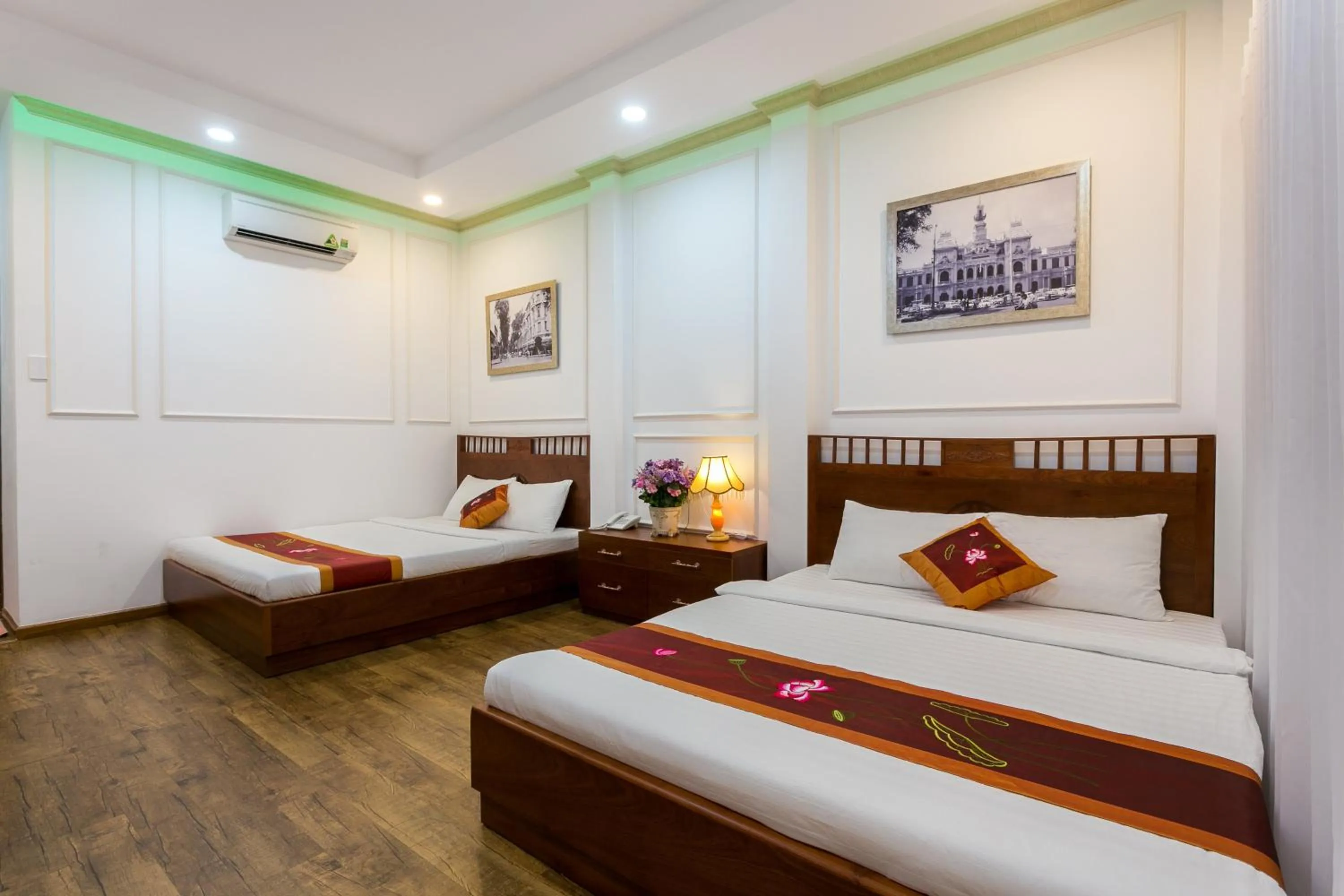 Bed in Indochine Ben Thanh Hotel & Apartments