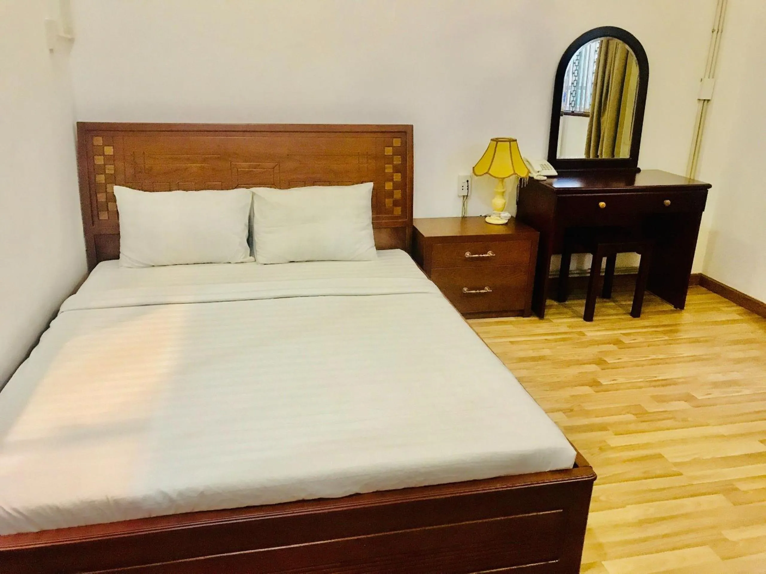 Bed in Indochine Ben Thanh Hotel & Apartments