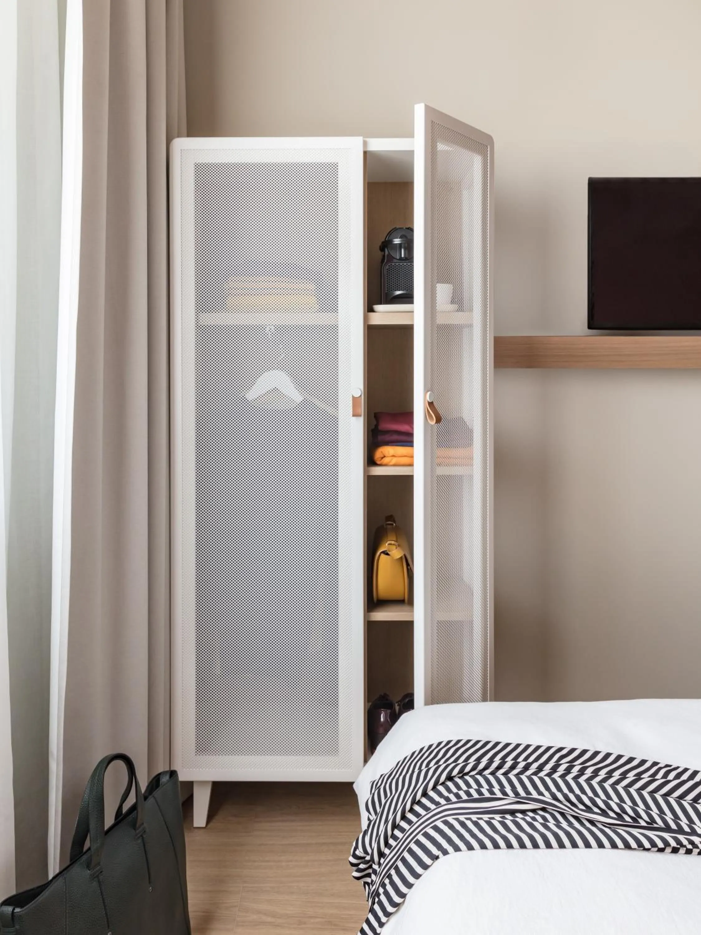 Decorative detail, Bed in OKKO Hotels Paris Gare de l'Est