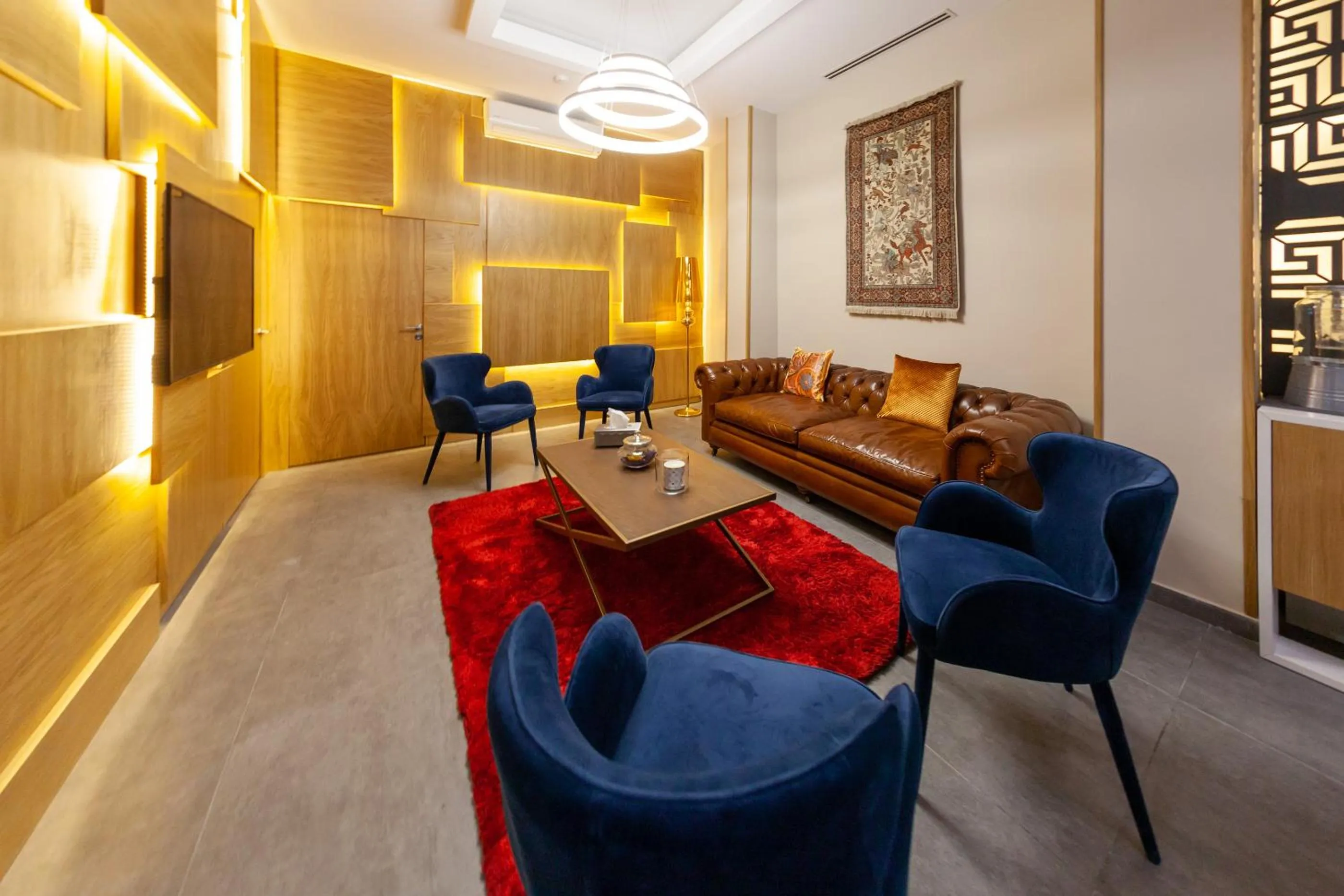 Communal lounge/ TV room in Hercules Boutique Hotel