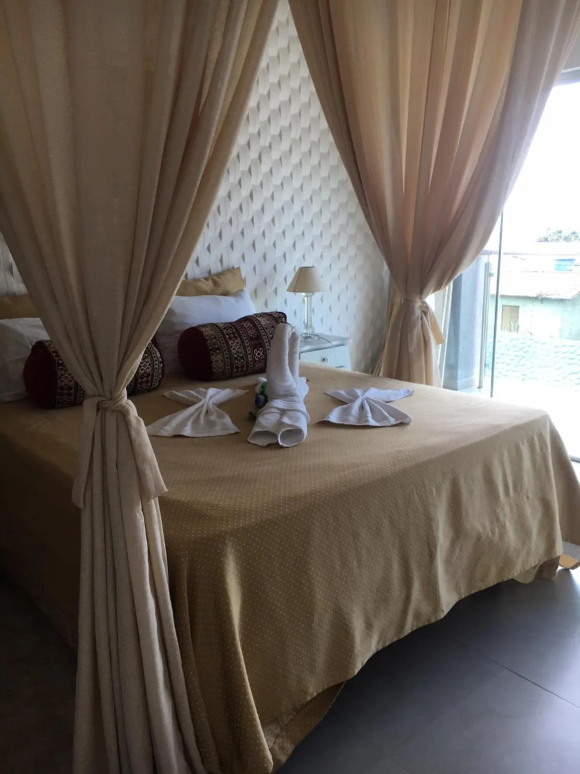 Bed in Relais de Charme Boutique Hotel Pititinga