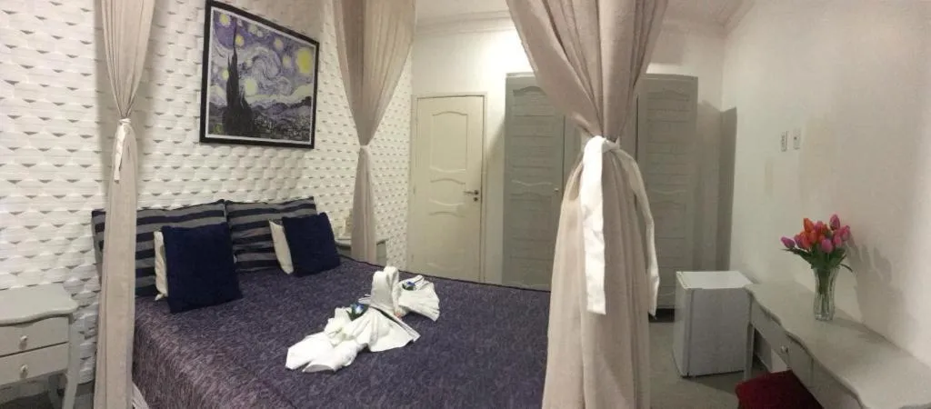 Photo of the whole room, Bed in Relais de Charme Boutique Hotel Pititinga