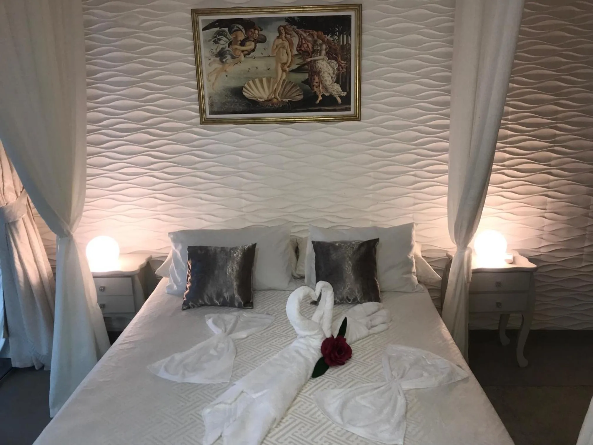 Bed in Relais de Charme Boutique Hotel Pititinga