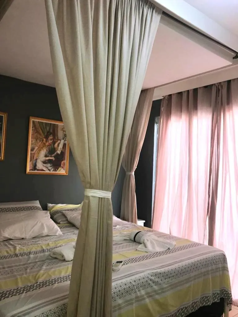 Bed in Relais de Charme Boutique Hotel Pititinga