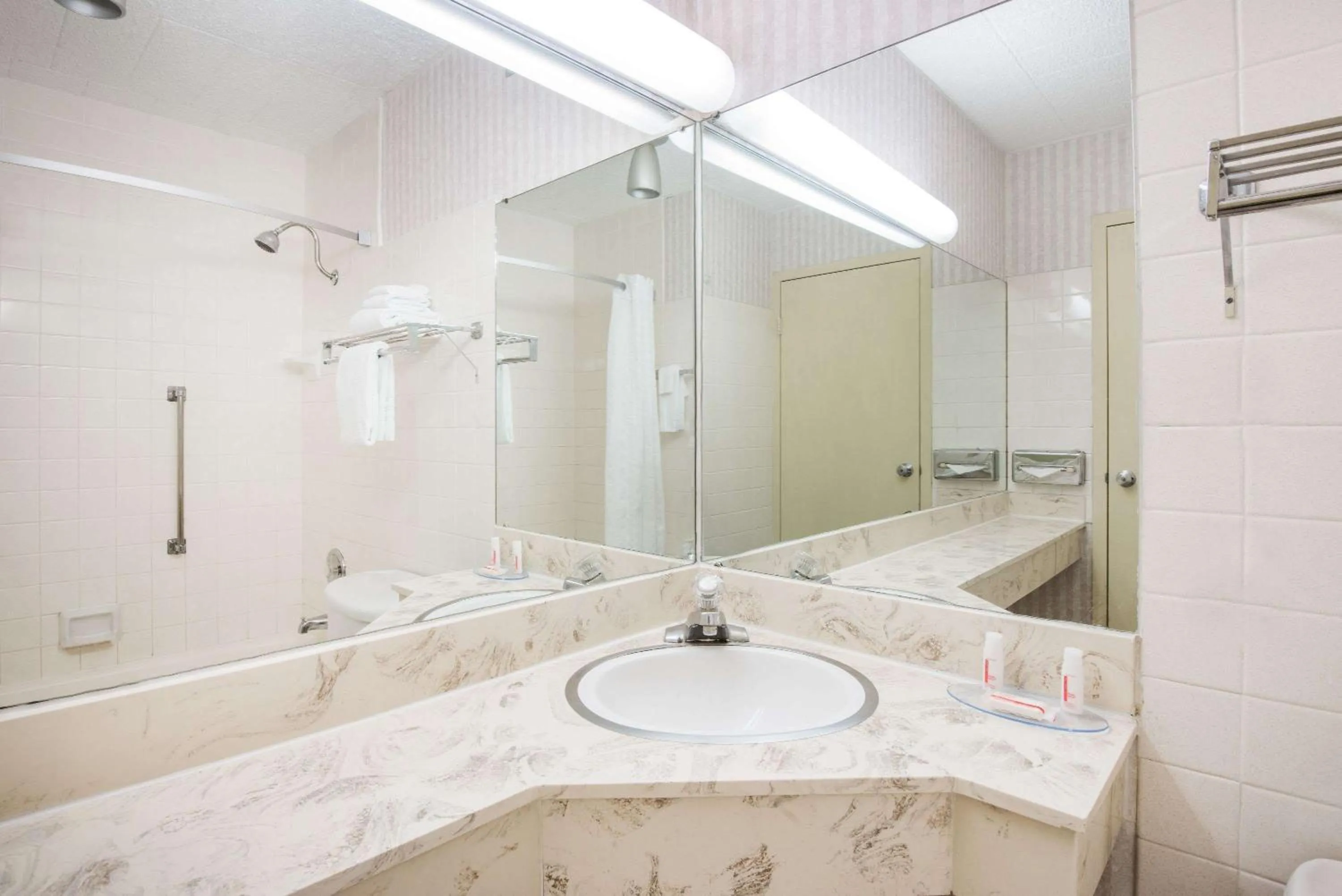 Bathroom in Super 8 by Wyndham Erie/I 90