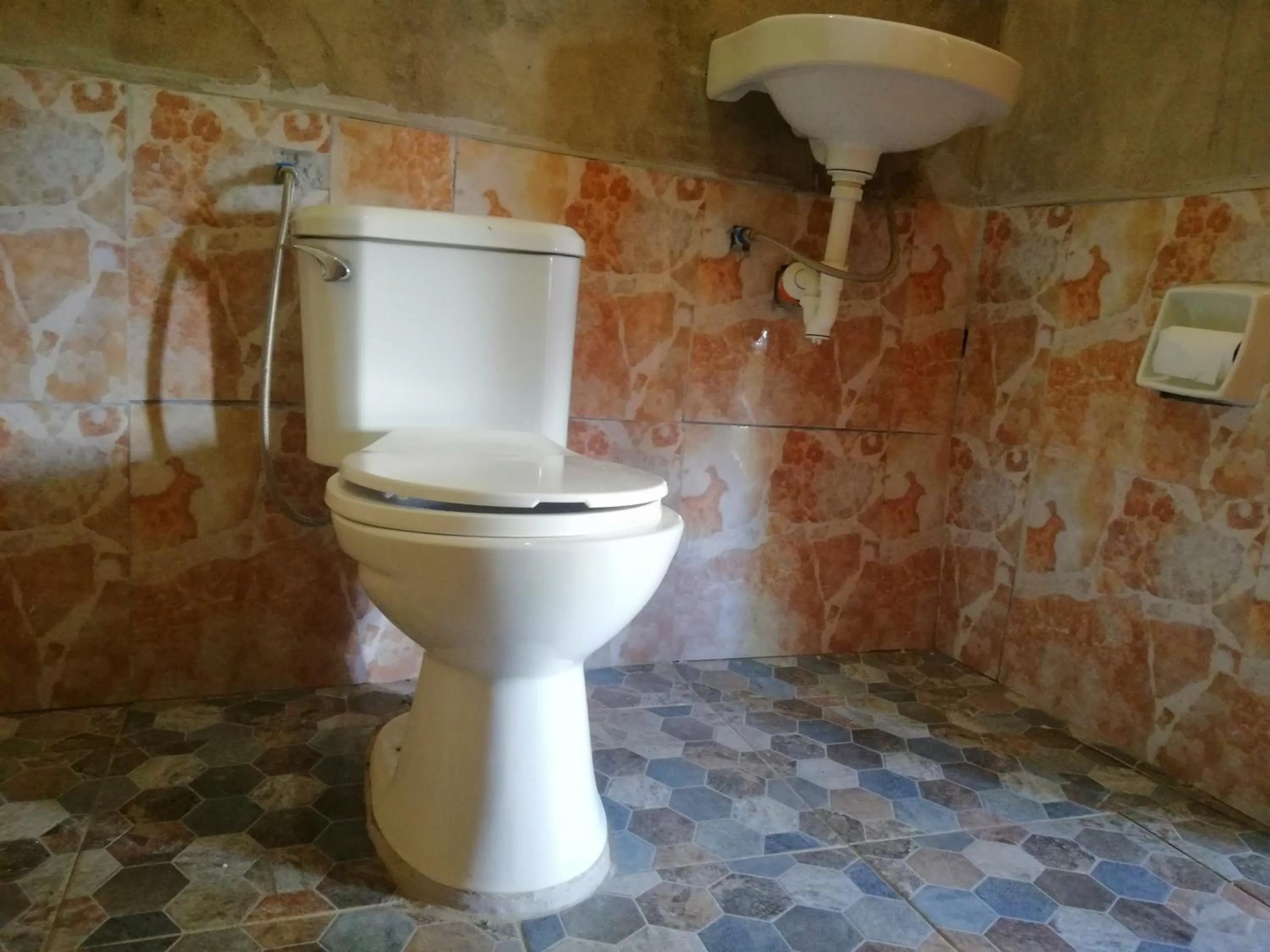 Toilet in Acuario Beach Inn
