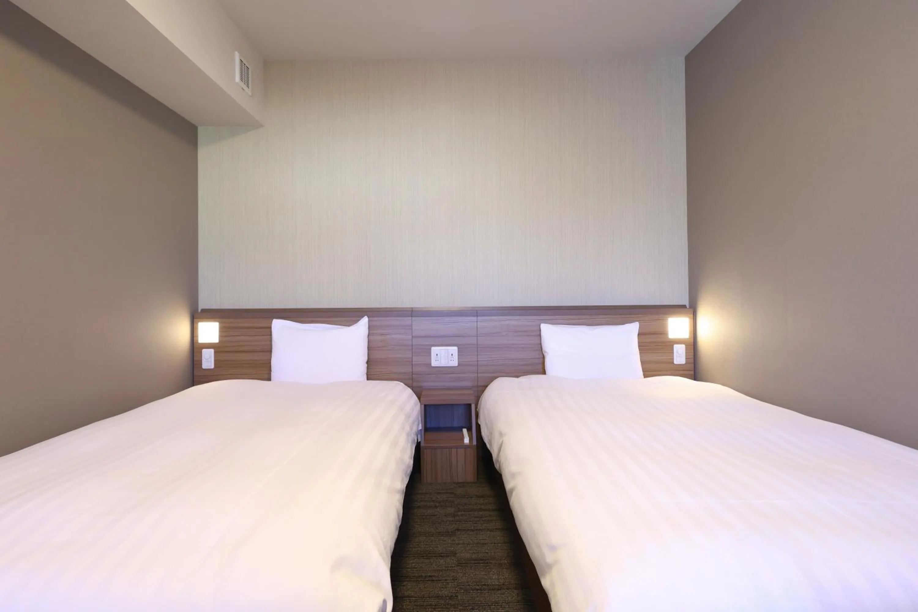 Bed in Dormy Inn Premium Fukui Natural Hot Spring