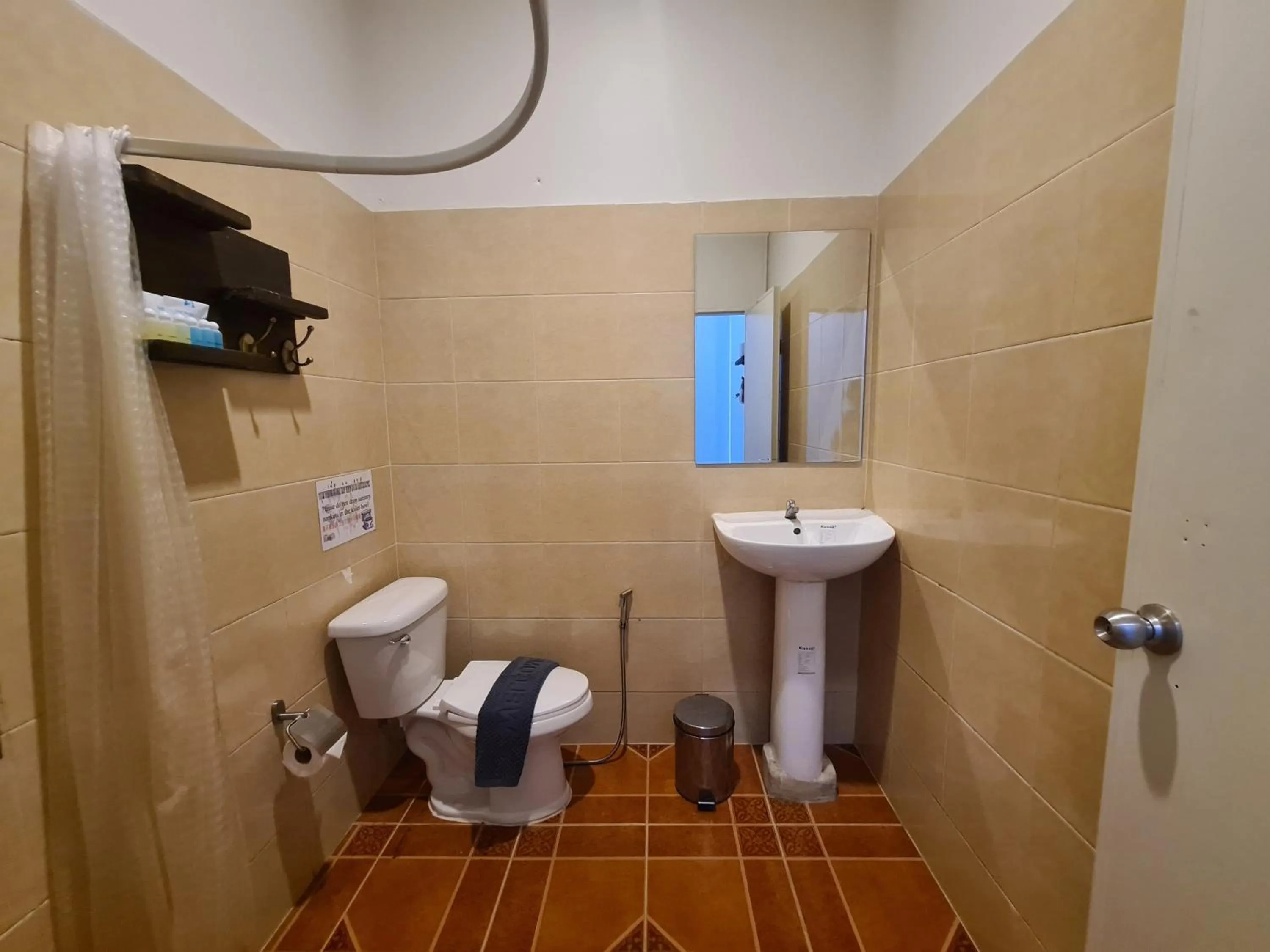 Toilet in Samed Your House Family Room