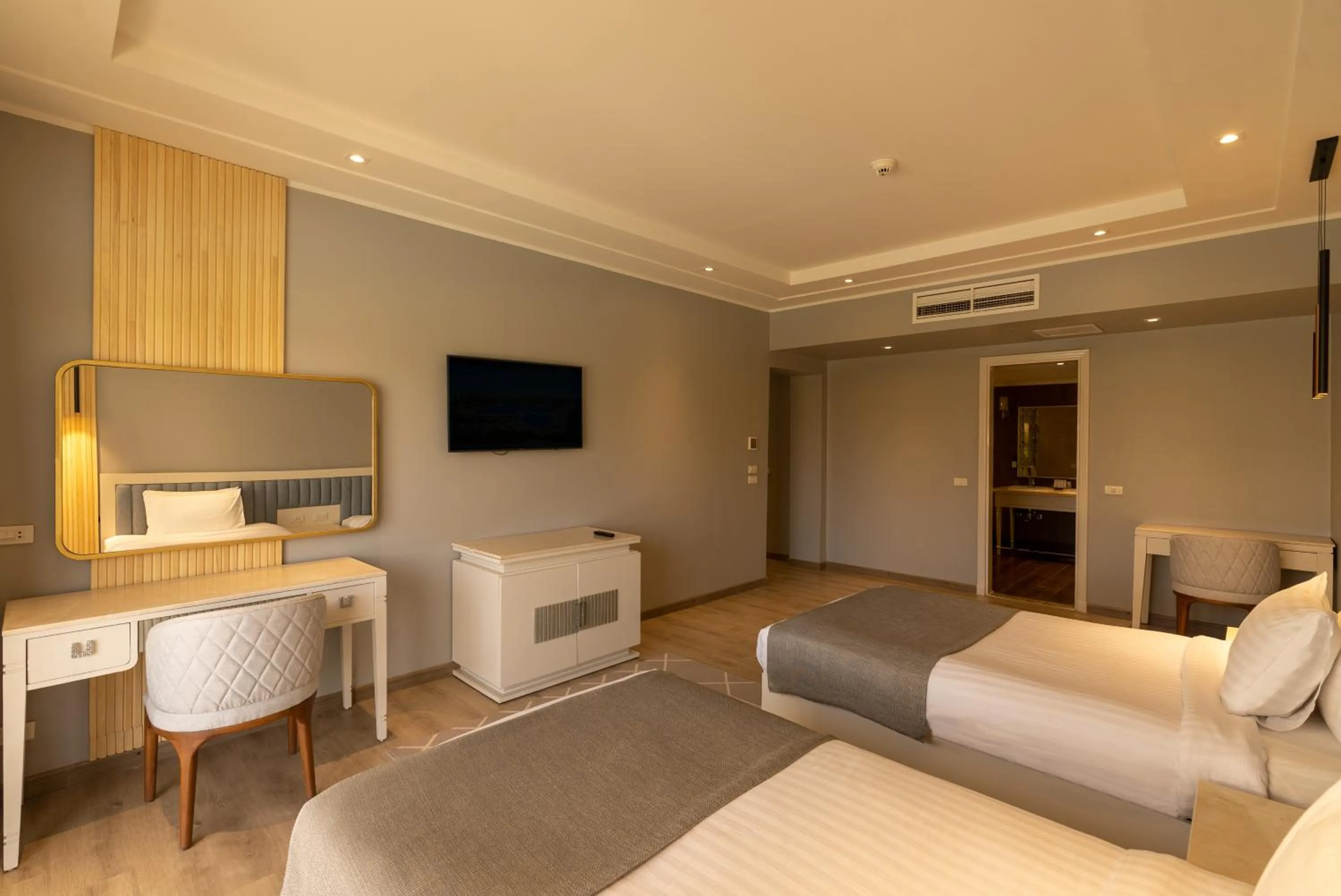 Bed in Sunrise Crystal Bay Resort -Grand Select