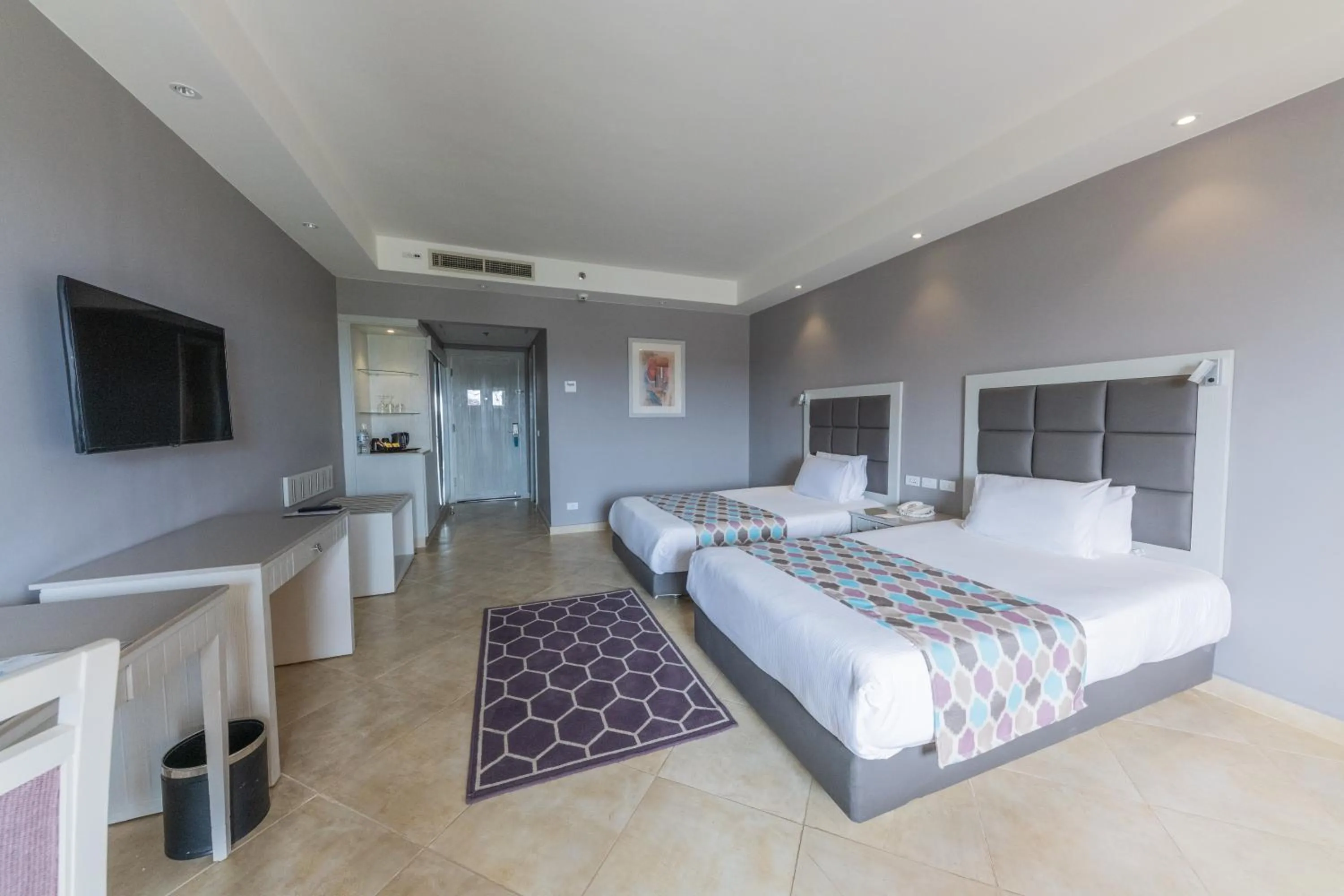 Bed in Sunrise Crystal Bay Resort -Grand Select