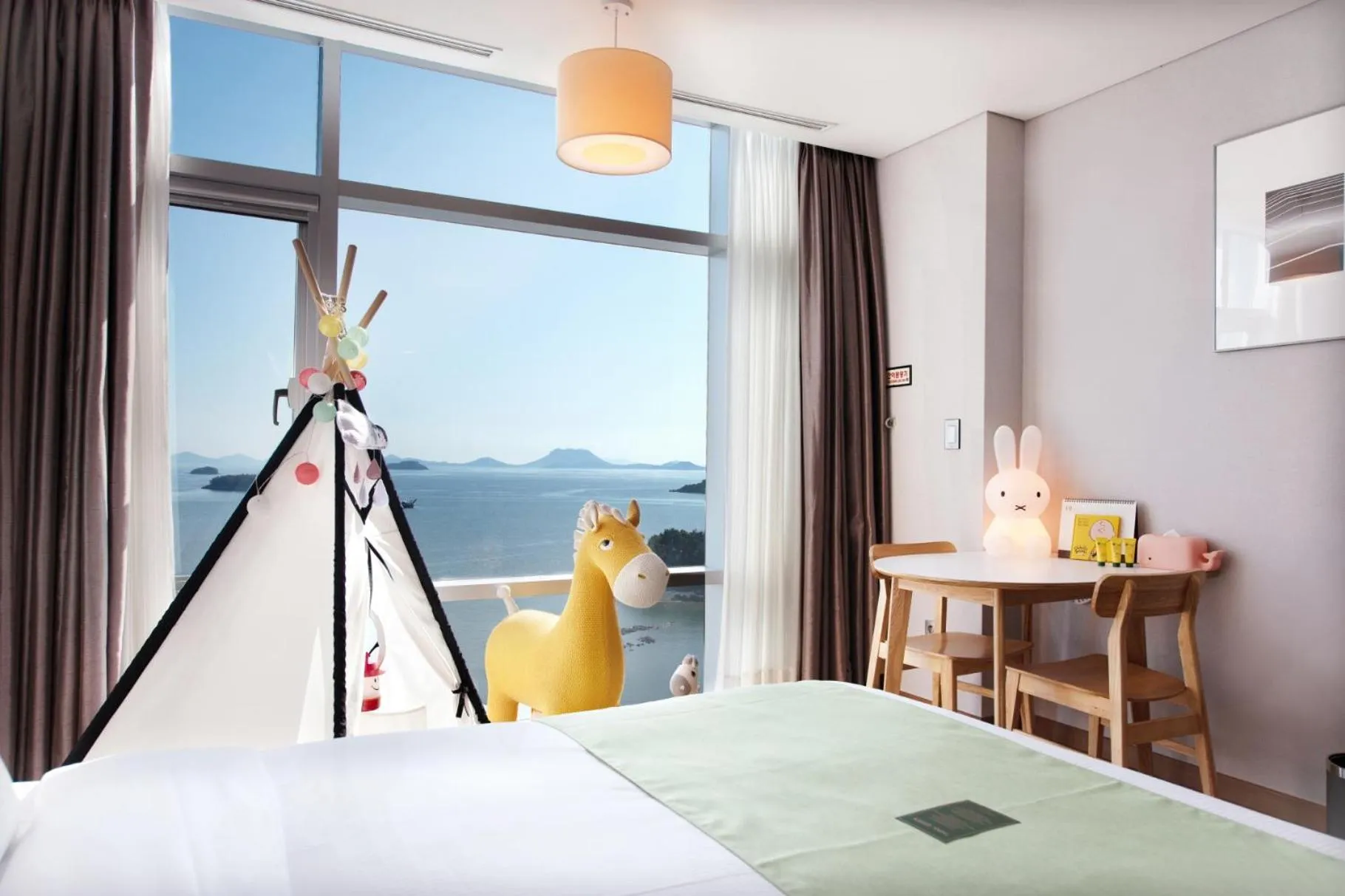 View (from property/room), Bed in Hidden Bay Hotel