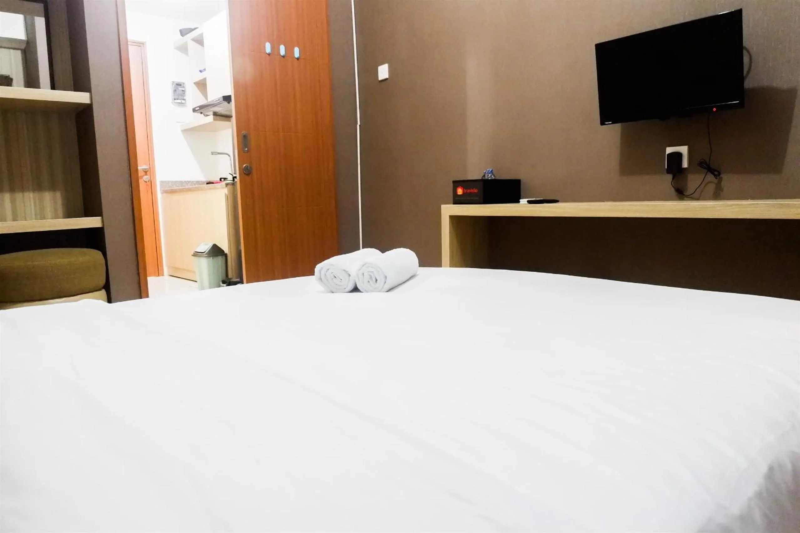 Bed in Modern Studio Apartment at Pavilion Permata 2 By Travelio