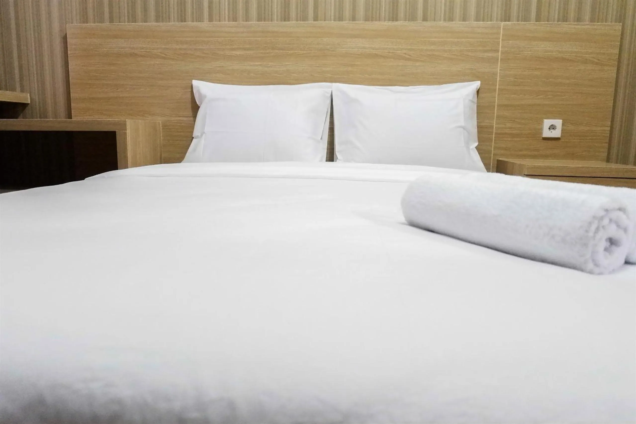 Bed in Modern Studio Apartment at Pavilion Permata 2 By Travelio